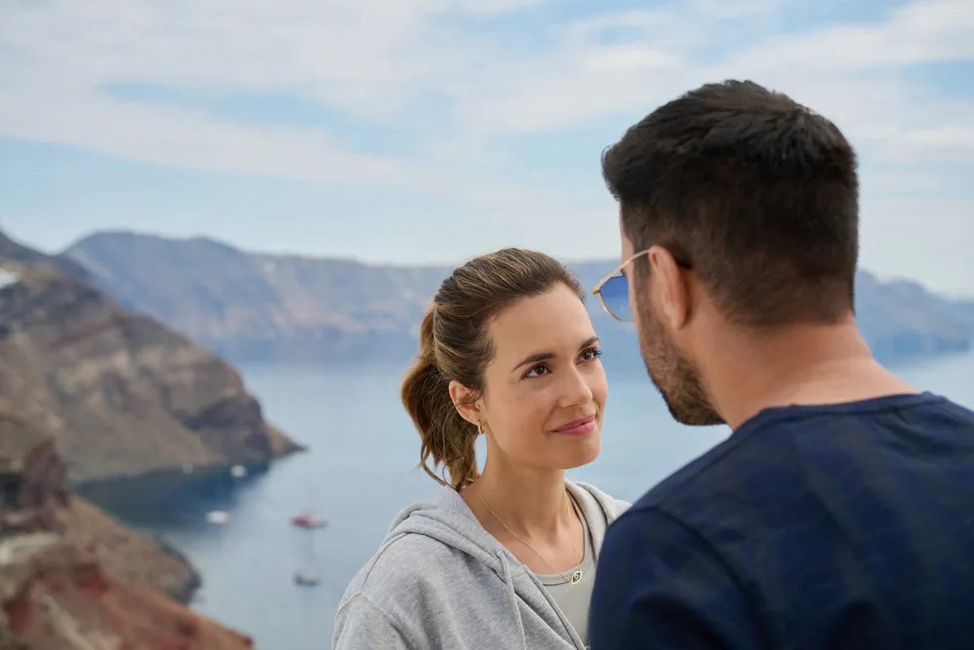 Yannis Tsimitselis and Torrey DeVitto in Love's Greek to Me (2023)