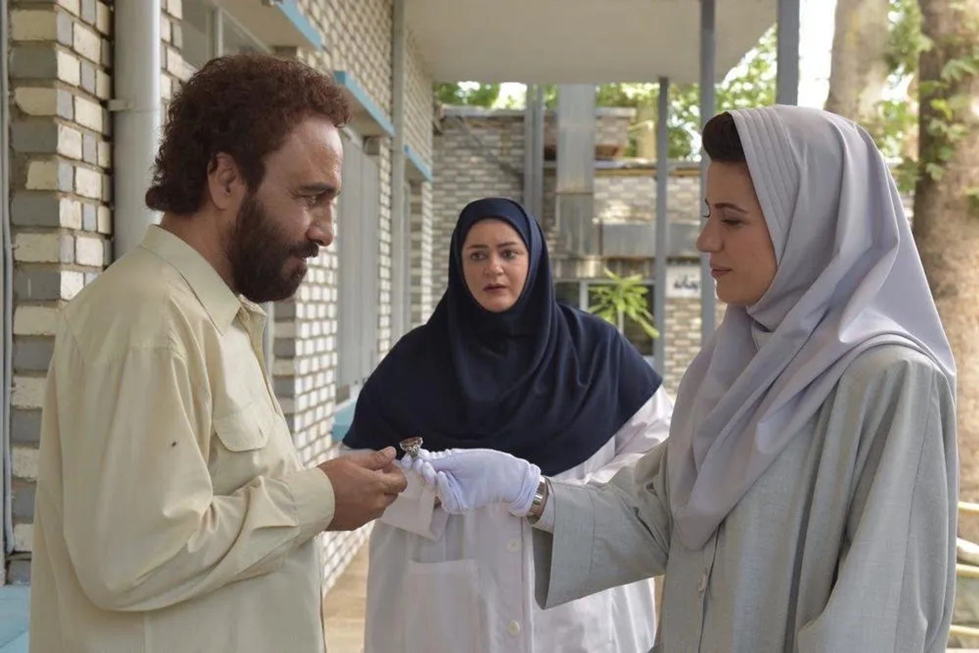 Reza Attaran, Sara Bahrami, and Naeimeh Nezamdoost in Centipede (2018)