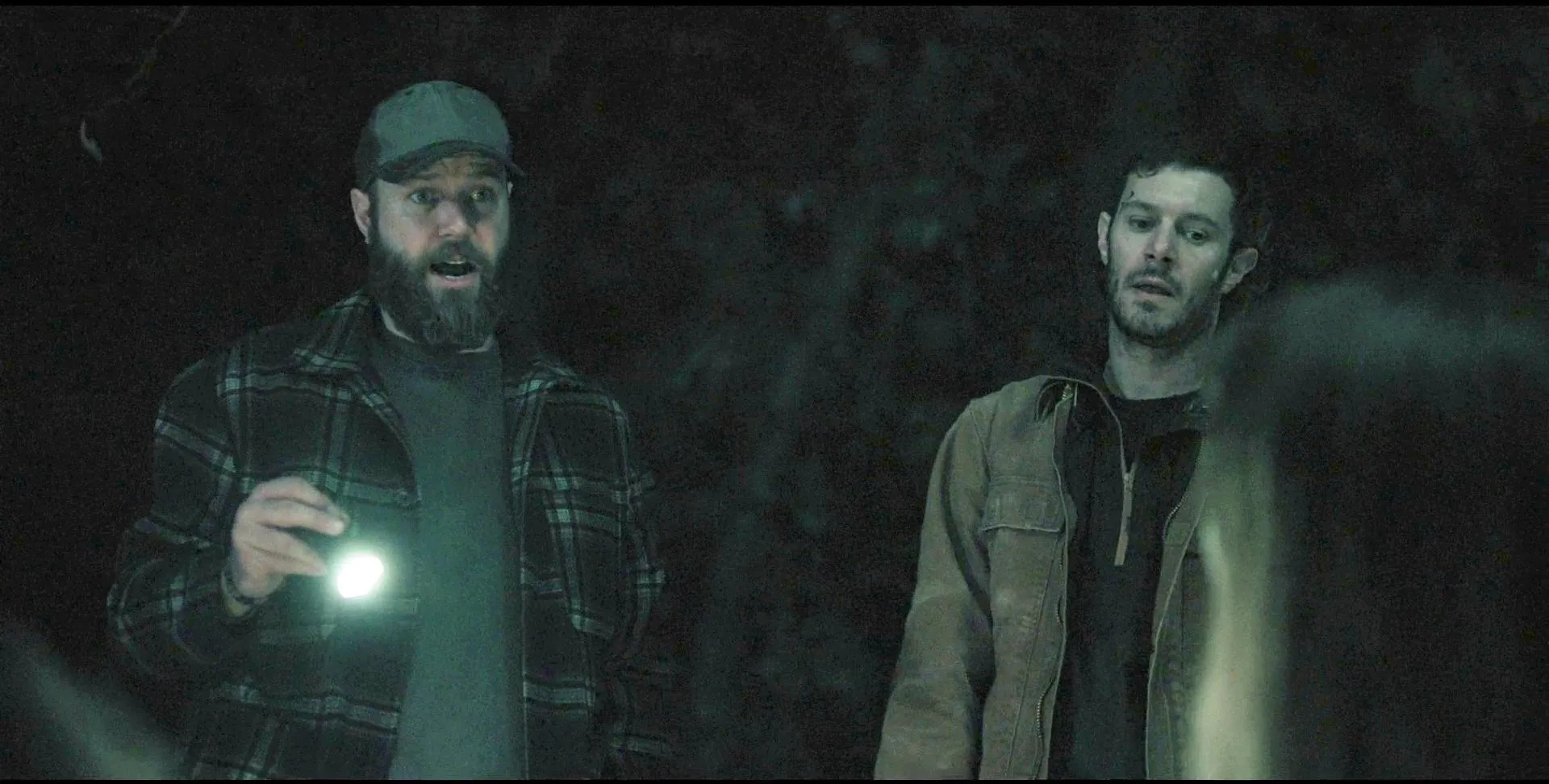 Adam Brody and Taran Killam in River Wild (2023)