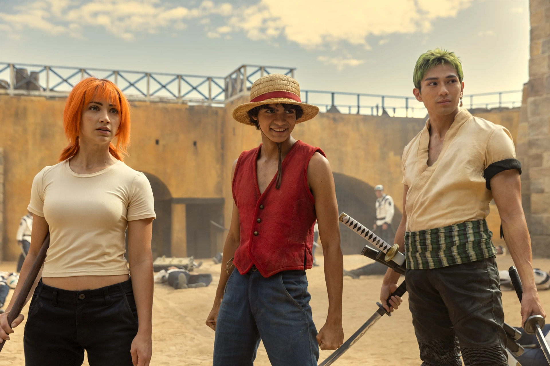 Mackenyu, Emily Rudd, and Iñaki Godoy in One Piece (2023)