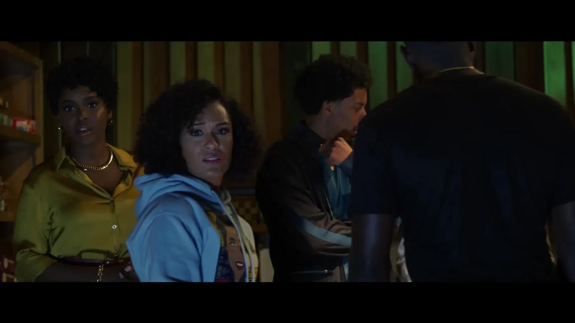 Antoinette Robertson, Melvin Gregg, and Grace Byers in The Blackening (2022)