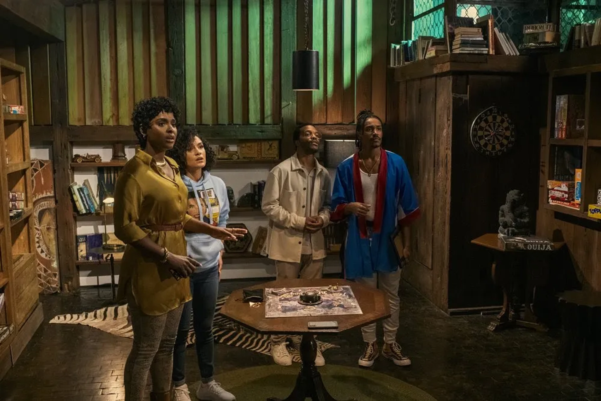 Jermaine Fowler, Antoinette Robertson, Dewayne Perkins, and Grace Byers in The Blackening (2022)