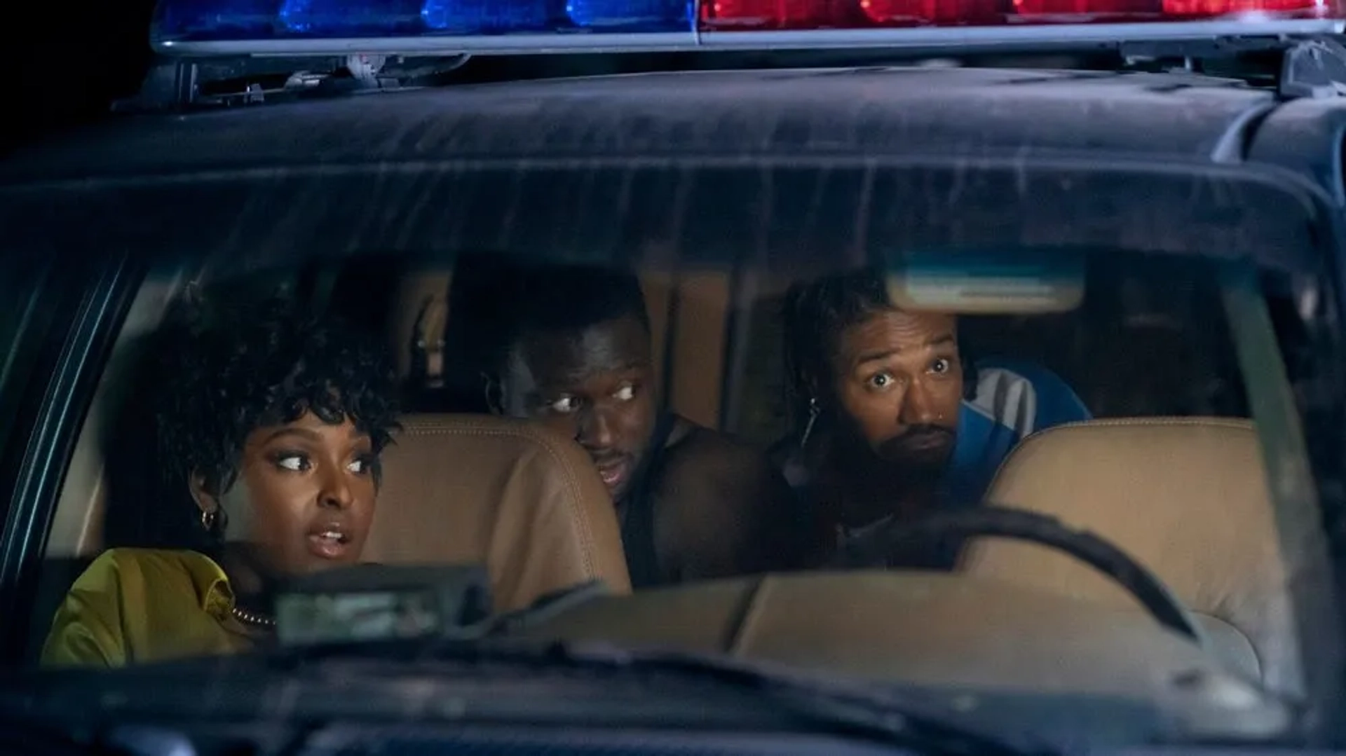 Sinqua Walls, Antoinette Robertson, and Dewayne Perkins in The Blackening (2022)