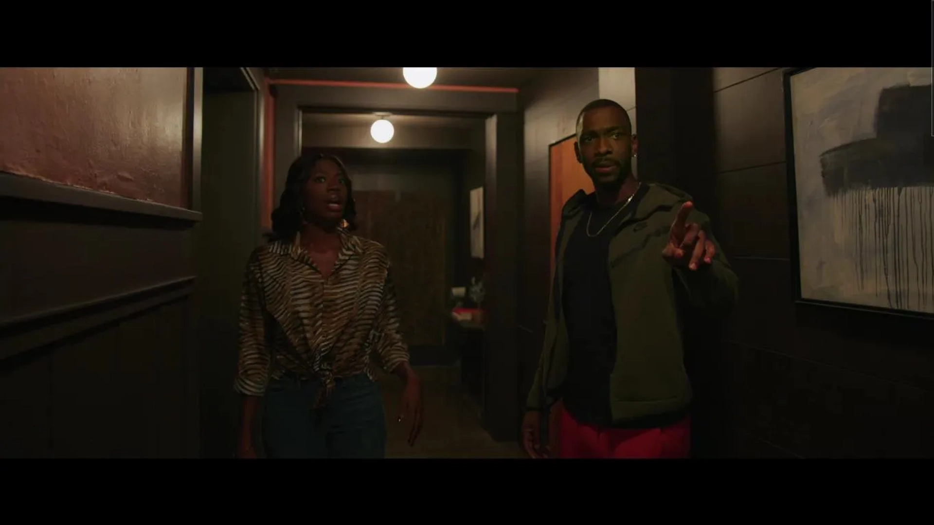 Jay Pharoah and Yvonne Orji in The Blackening (2022)