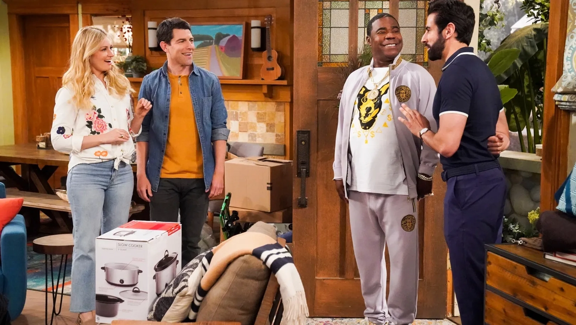 Max Greenfield, Tracy Morgan, Beth Behrs, and Anosh McAdam in The Neighborhood: Welcome to Bro Money, Bro Problems (2022)