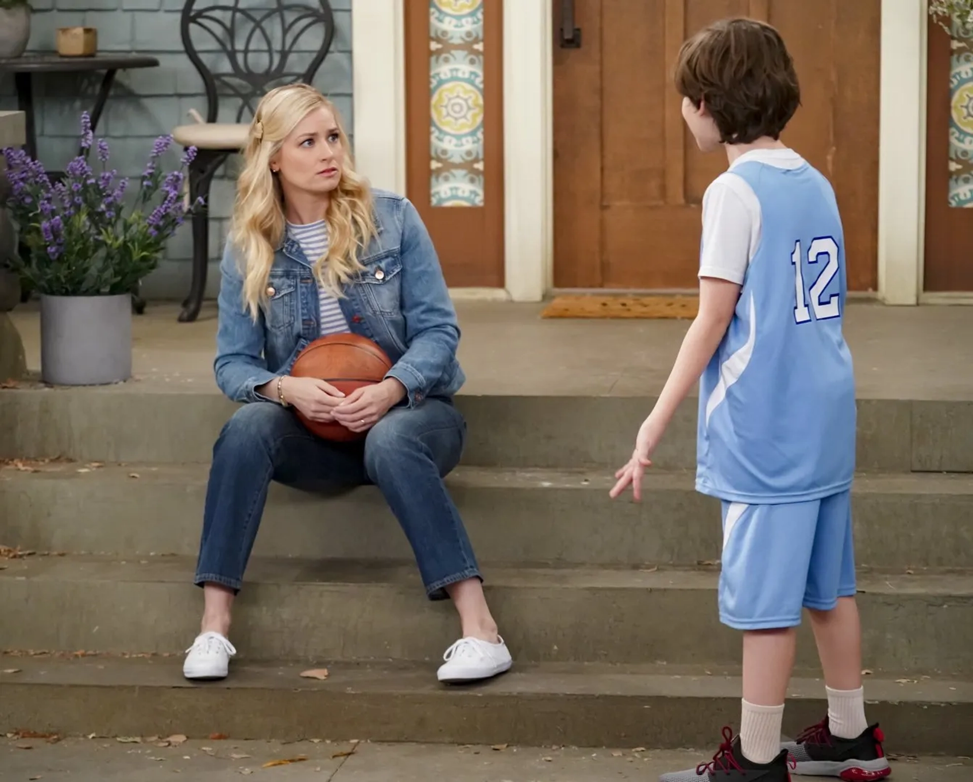 Beth Behrs and Hank Greenspan in The Neighborhood: Welcome to the Team (2020)