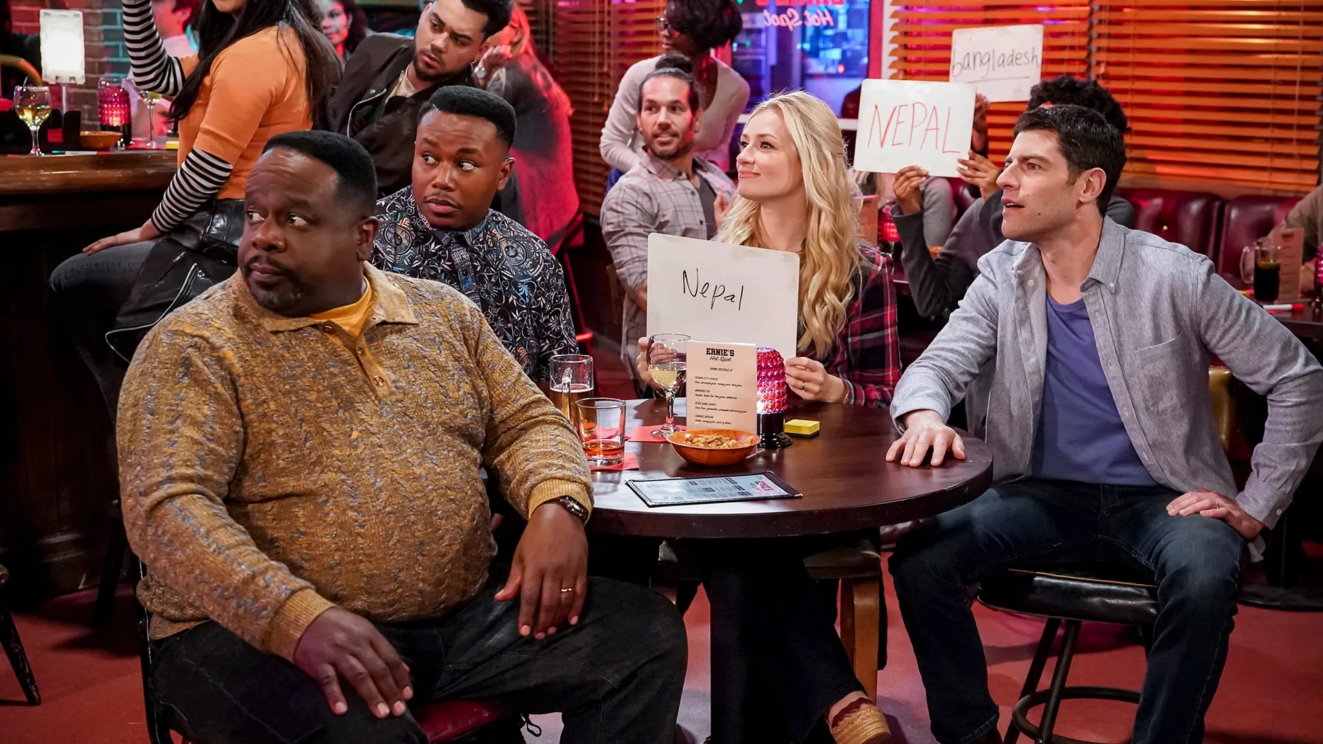 Cedric The Entertainer, Max Greenfield, Beth Behrs, and Marcel Spears in The Neighborhood: Welcome to Trivia Night (2020)