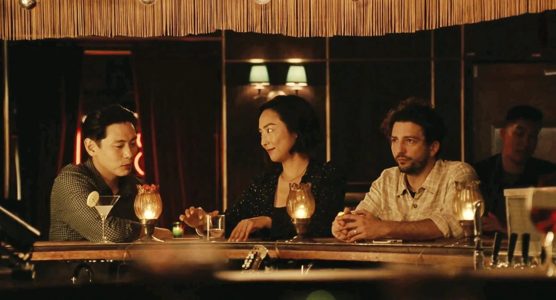 Teo Yoo, John Magaro, and Greta Lee in Past Lives (2023)