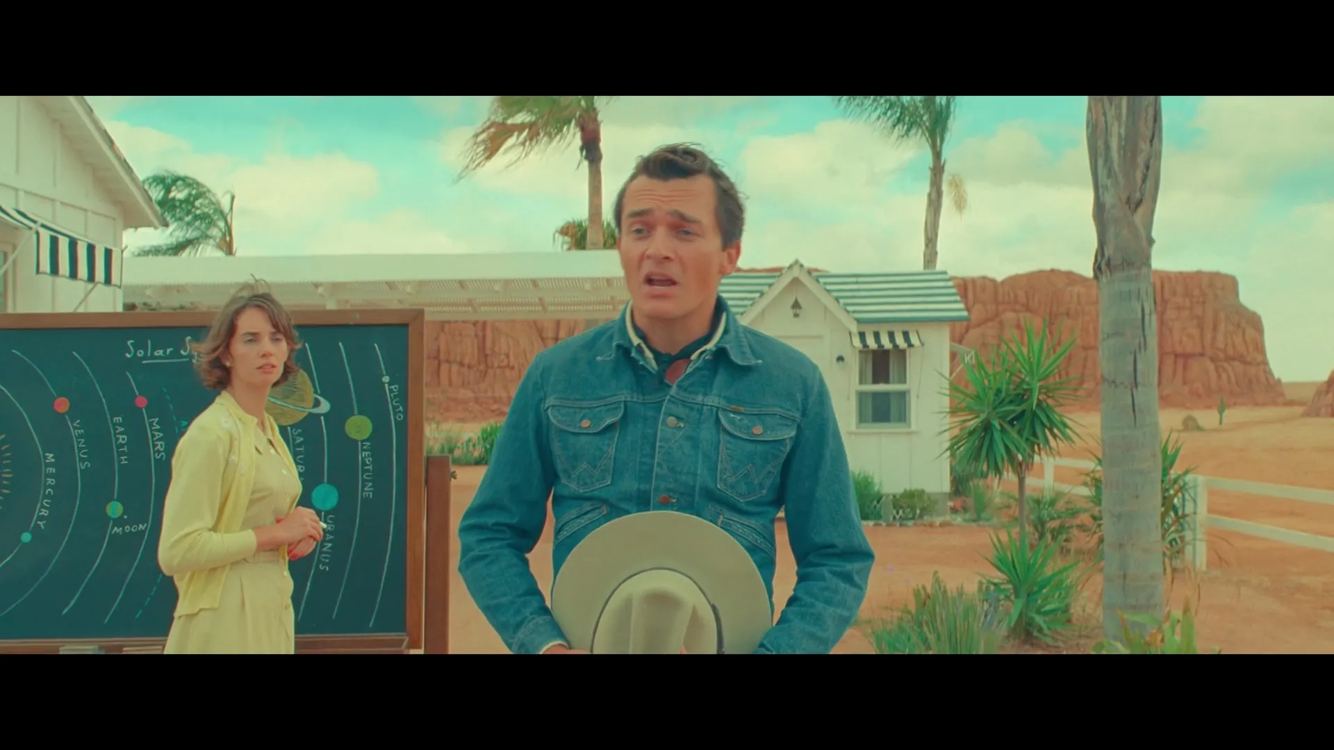 Maya Hawke and Rupert Friend in Asteroid City (2023)