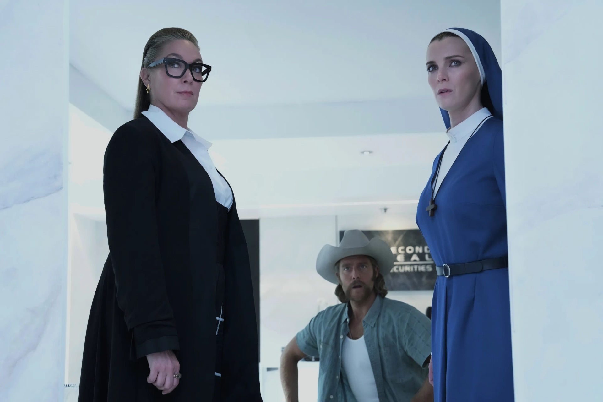 Elizabeth Marvel, Jake McDorman, and Betty Gilpin in Mrs. Davis (2023)