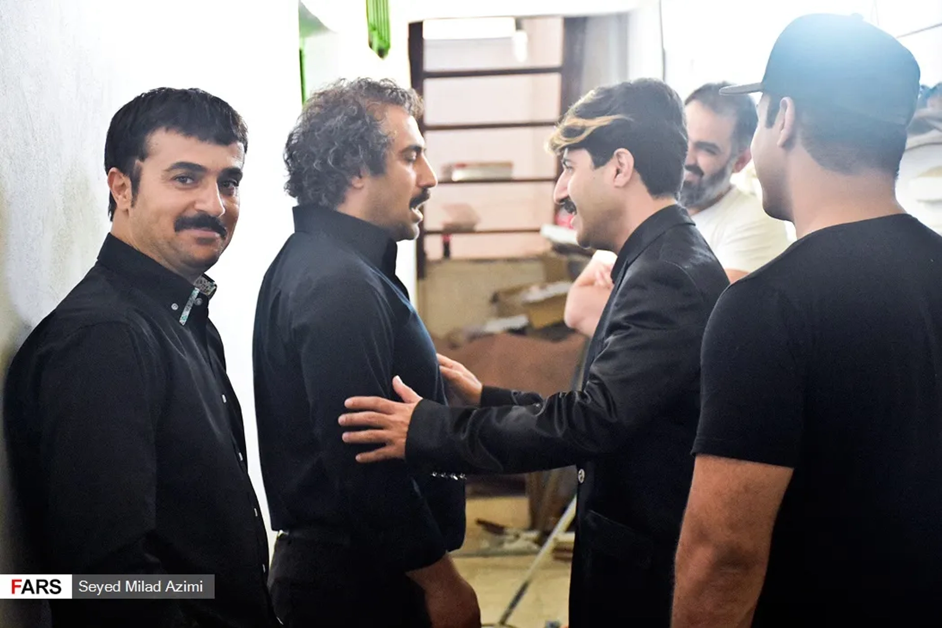 Mohsen Tanabandeh, Ahmad Mehranfar, and Hooman Hajabdollahi in Capital (2011)