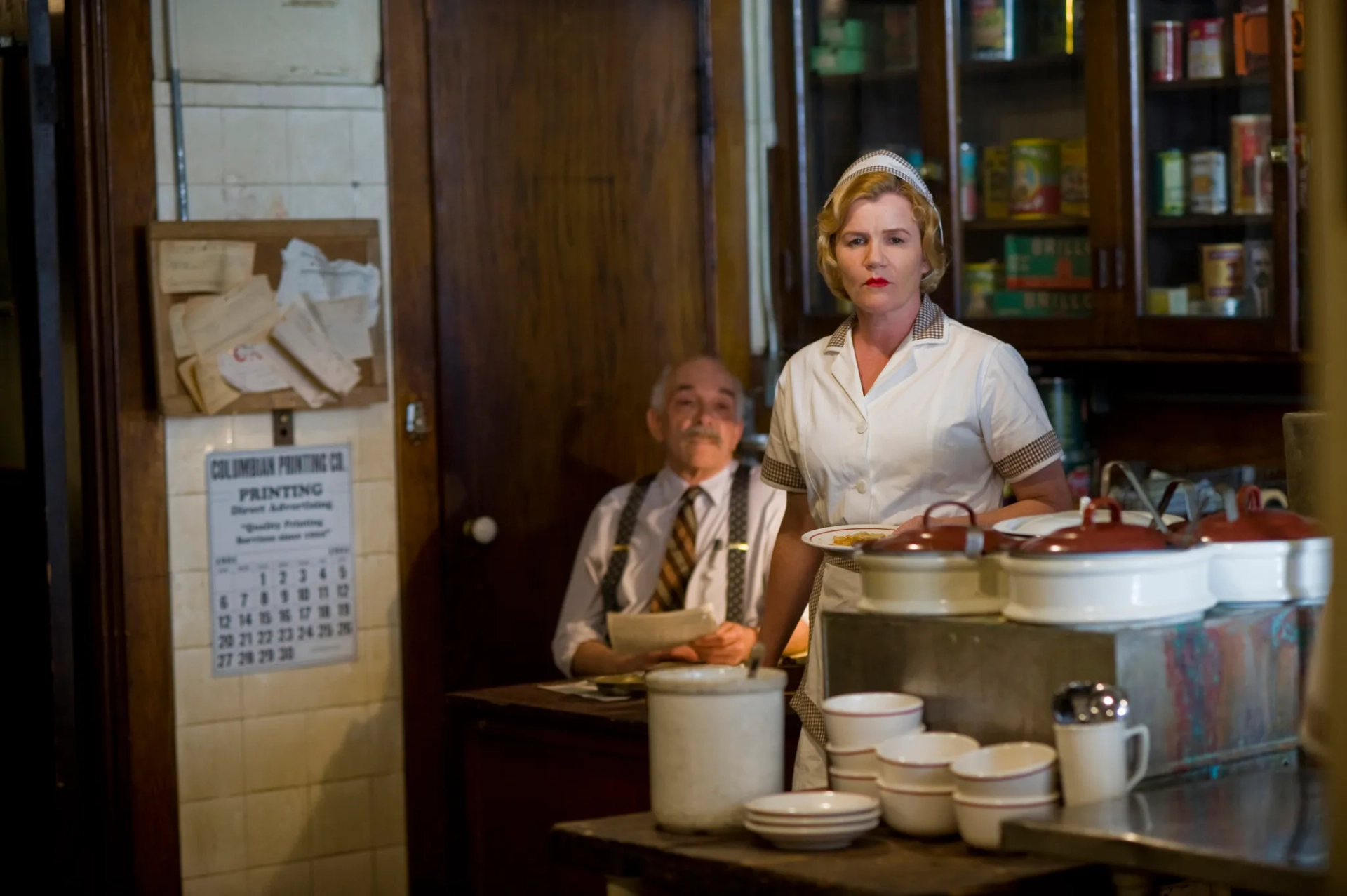 Mare Winningham and Mark Margolis in Mildred Pierce (2011)