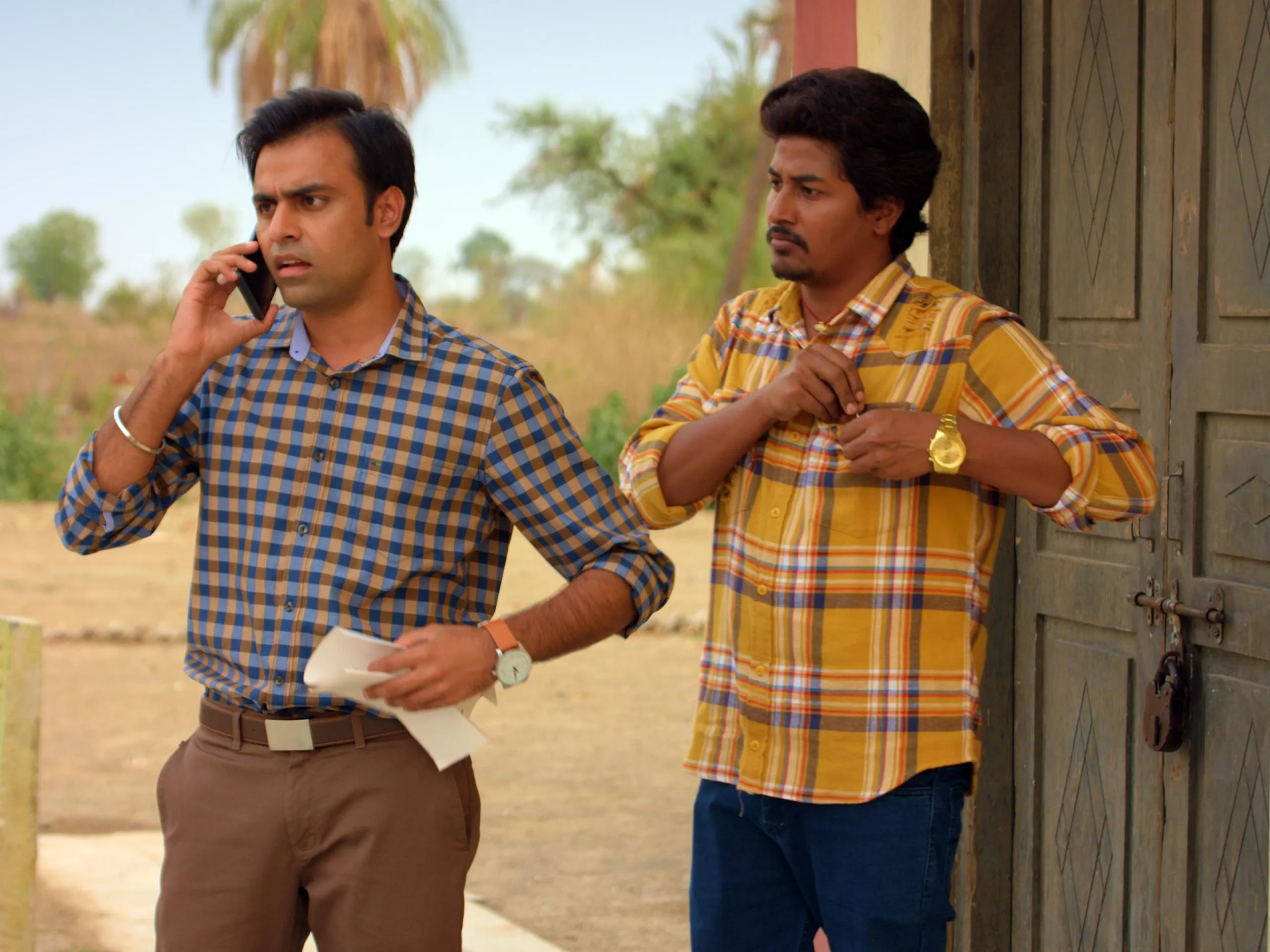 Chandan Roy and Jitendra Kumar in Panchayat (2020)