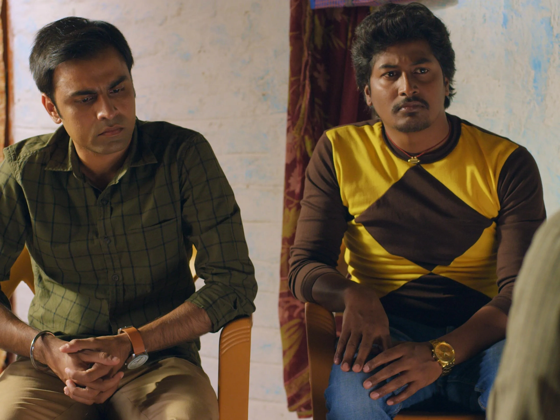 Chandan Roy and Jitendra Kumar in Panchayat (2020)