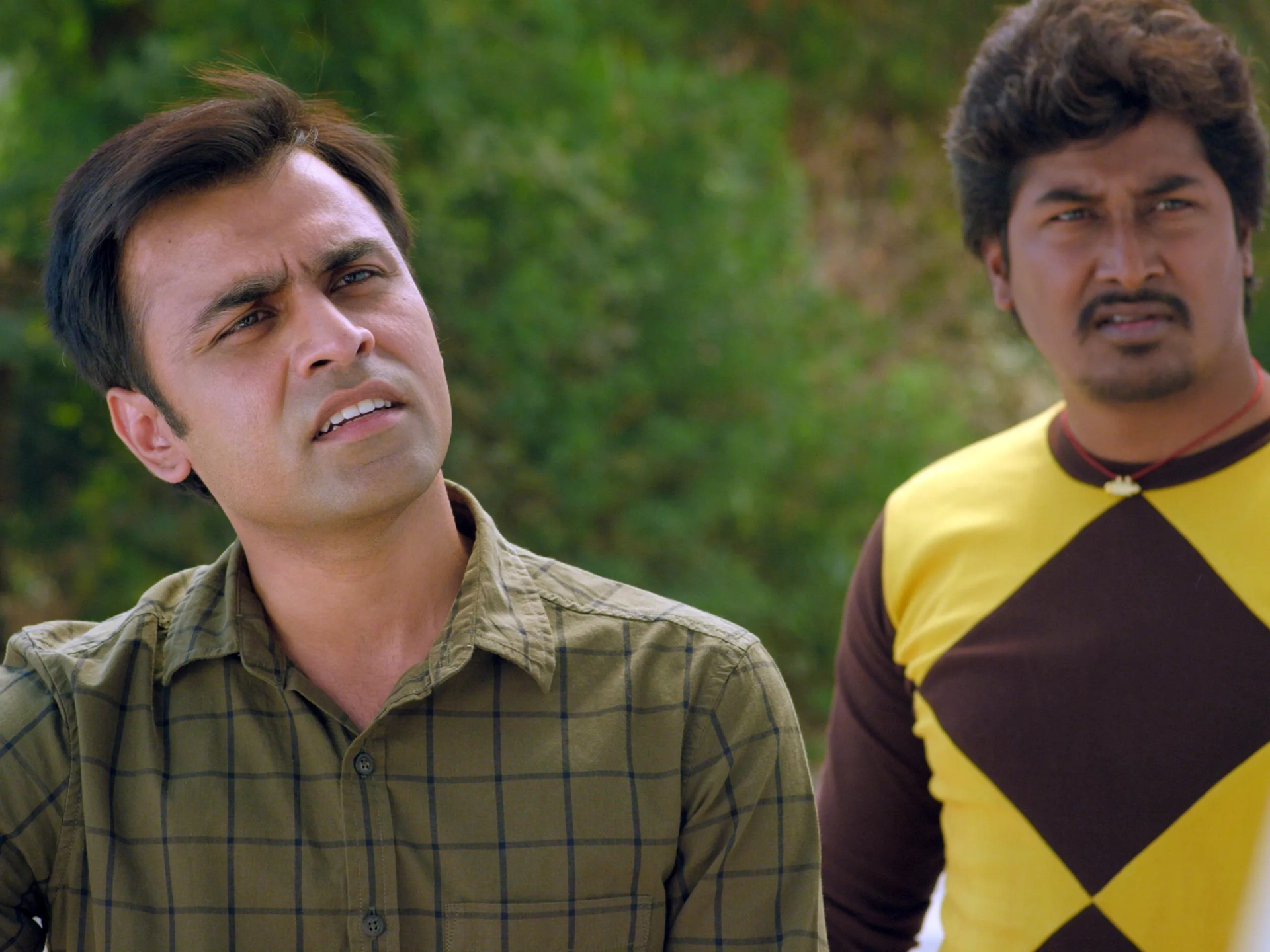 Chandan Roy and Jitendra Kumar in Panchayat (2020)