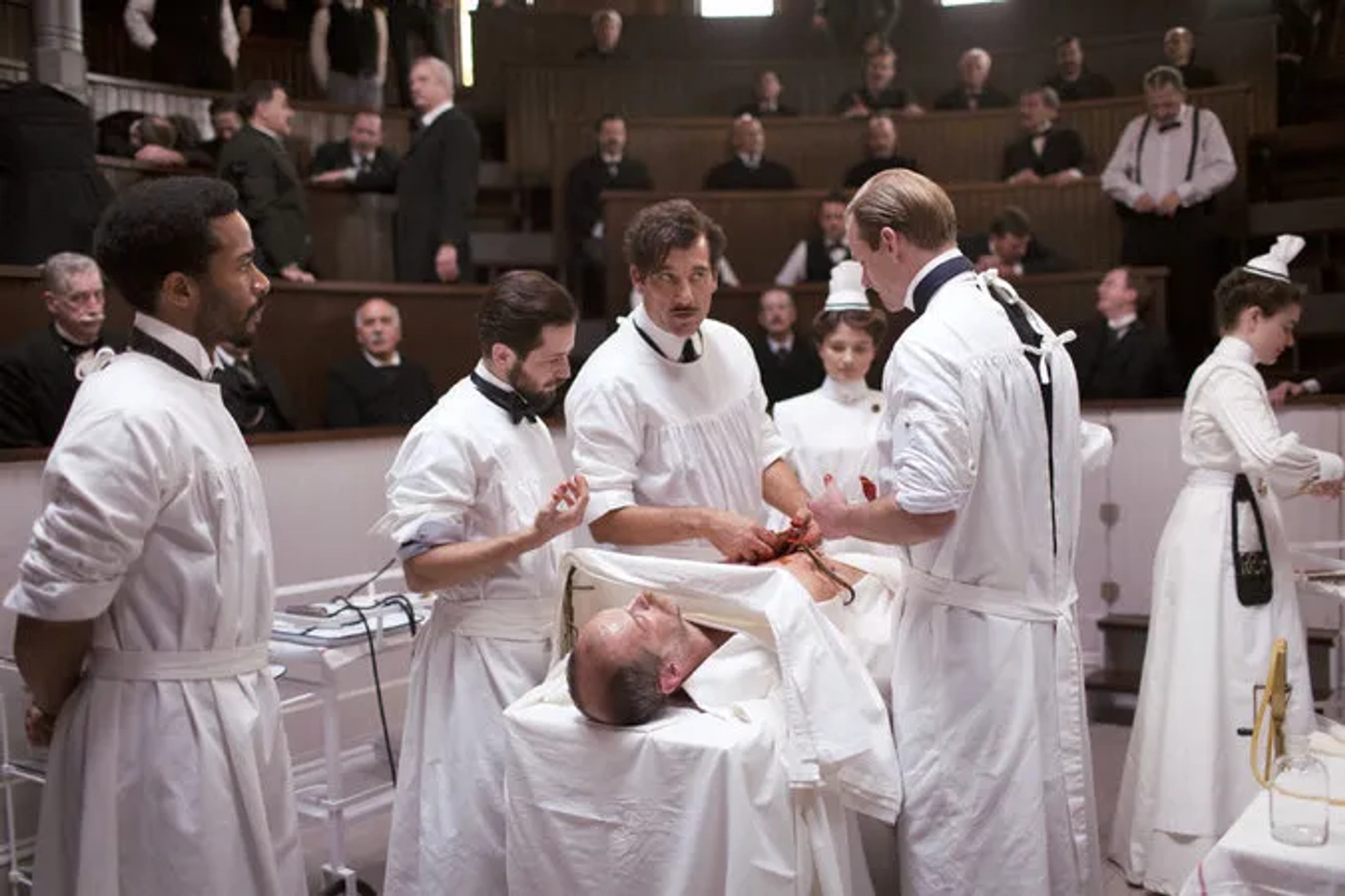 Andre Holland, Michael Angarano, Clive Owen, Louis Butelli, Eve Hewson, Jeremy Bobb, and Cait Cortelyou in "The Knick" (2014)