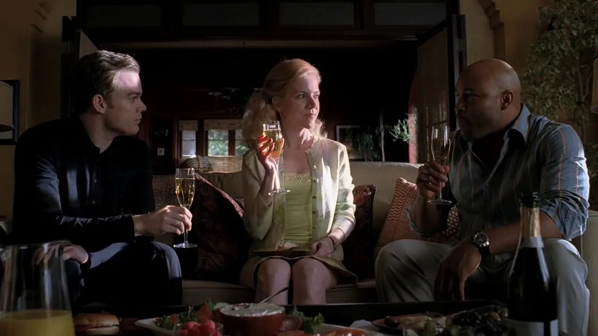 Jennifer Elise Cox, Michael C. Hall, and Mathew St. Patrick in Six Feet Under (2001)