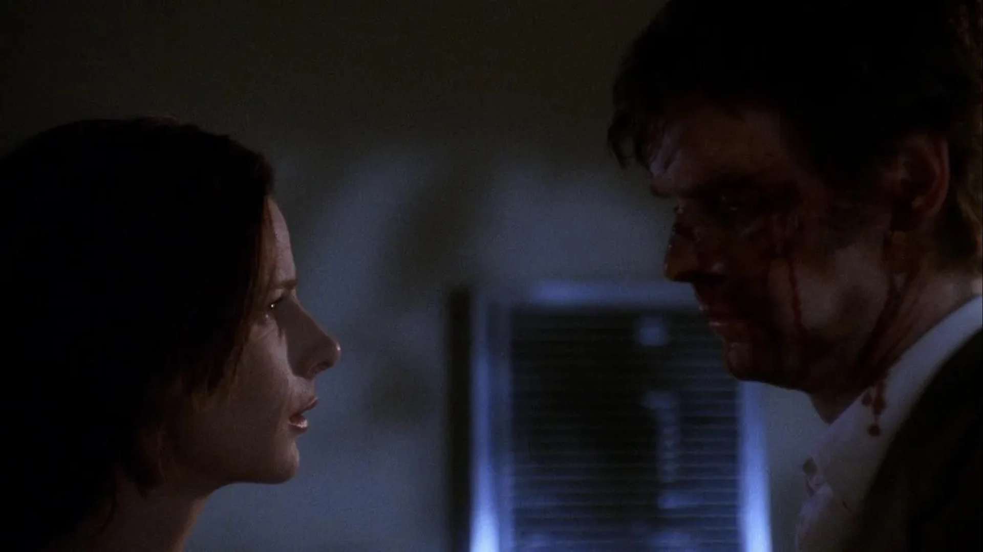 Rachel Griffiths and Peter Krause in Six Feet Under (2001)