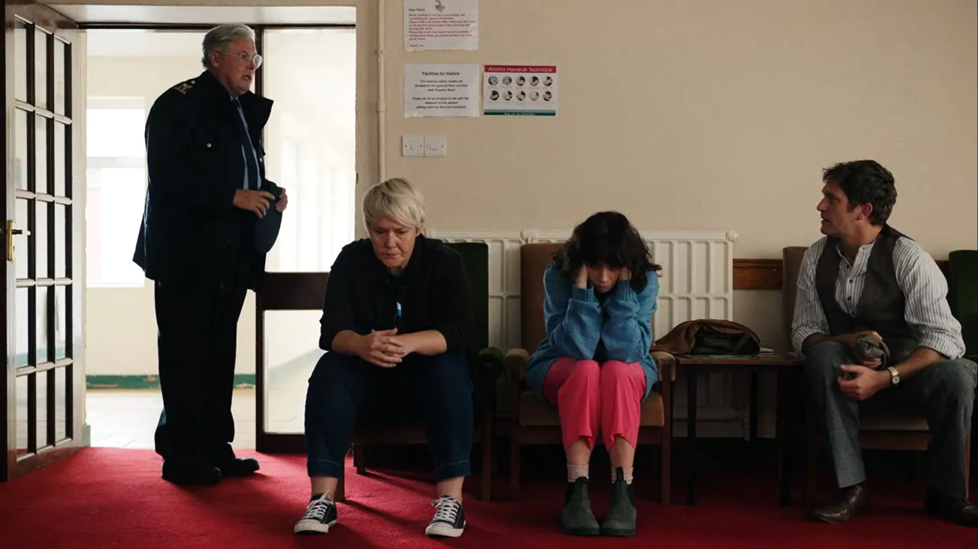 Conleth Hill, Lochlann O'Mearáin, Charlene McKenna, and Amy Conroy in Holding (2022)