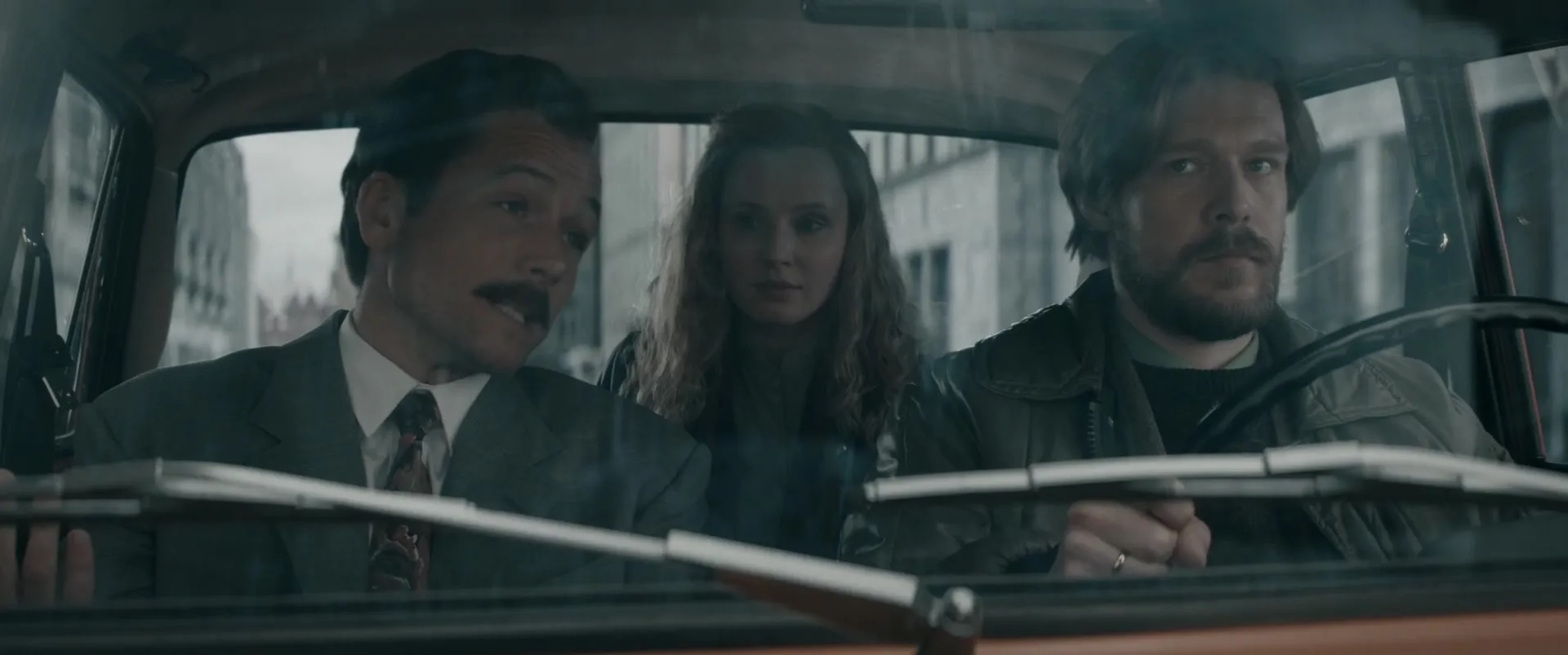 Nikita Efremov, Taron Egerton, and Sofya Lebedeva in Tetris (2023)