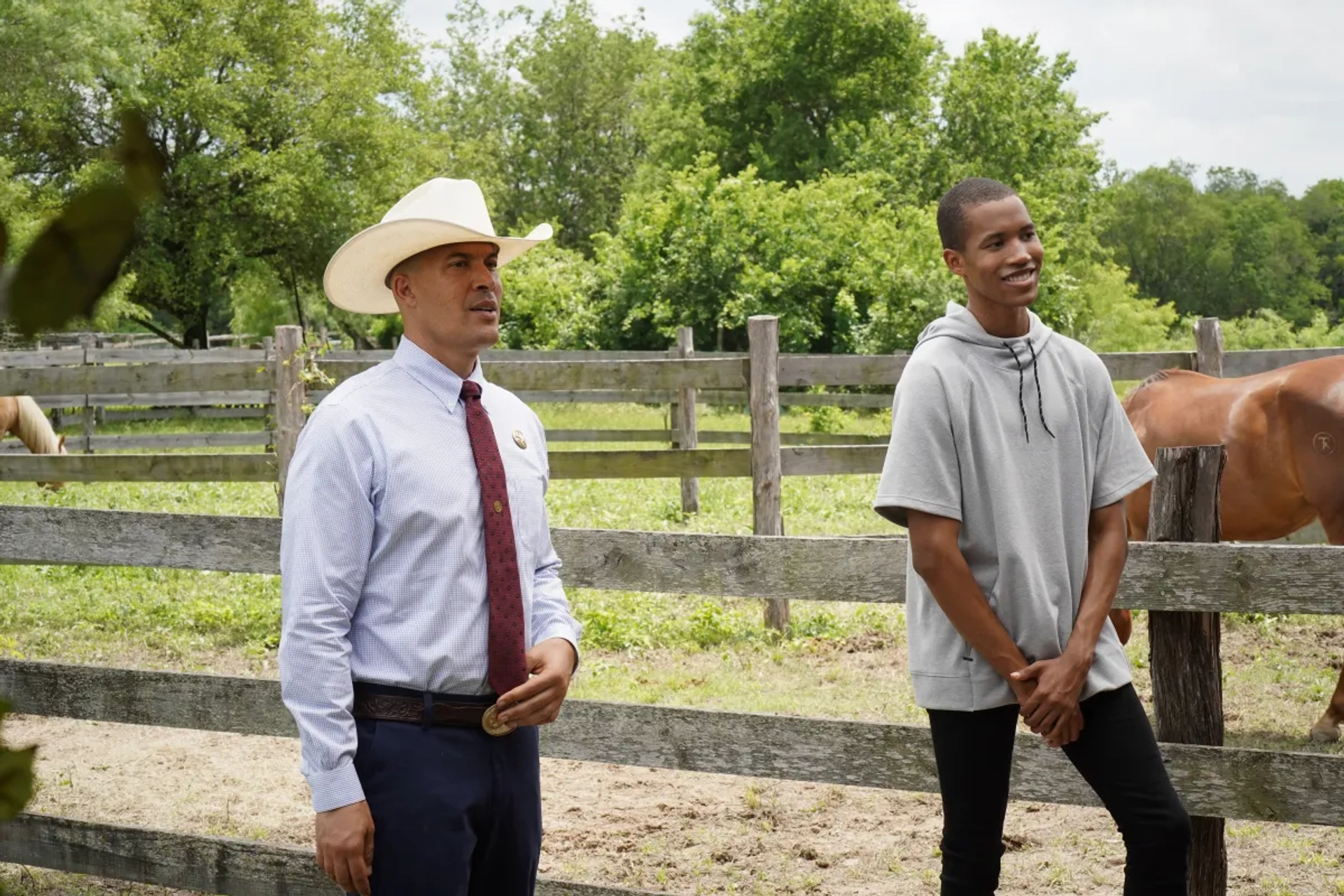 Coby Bell and Joshua Brockington in Walker (2021)