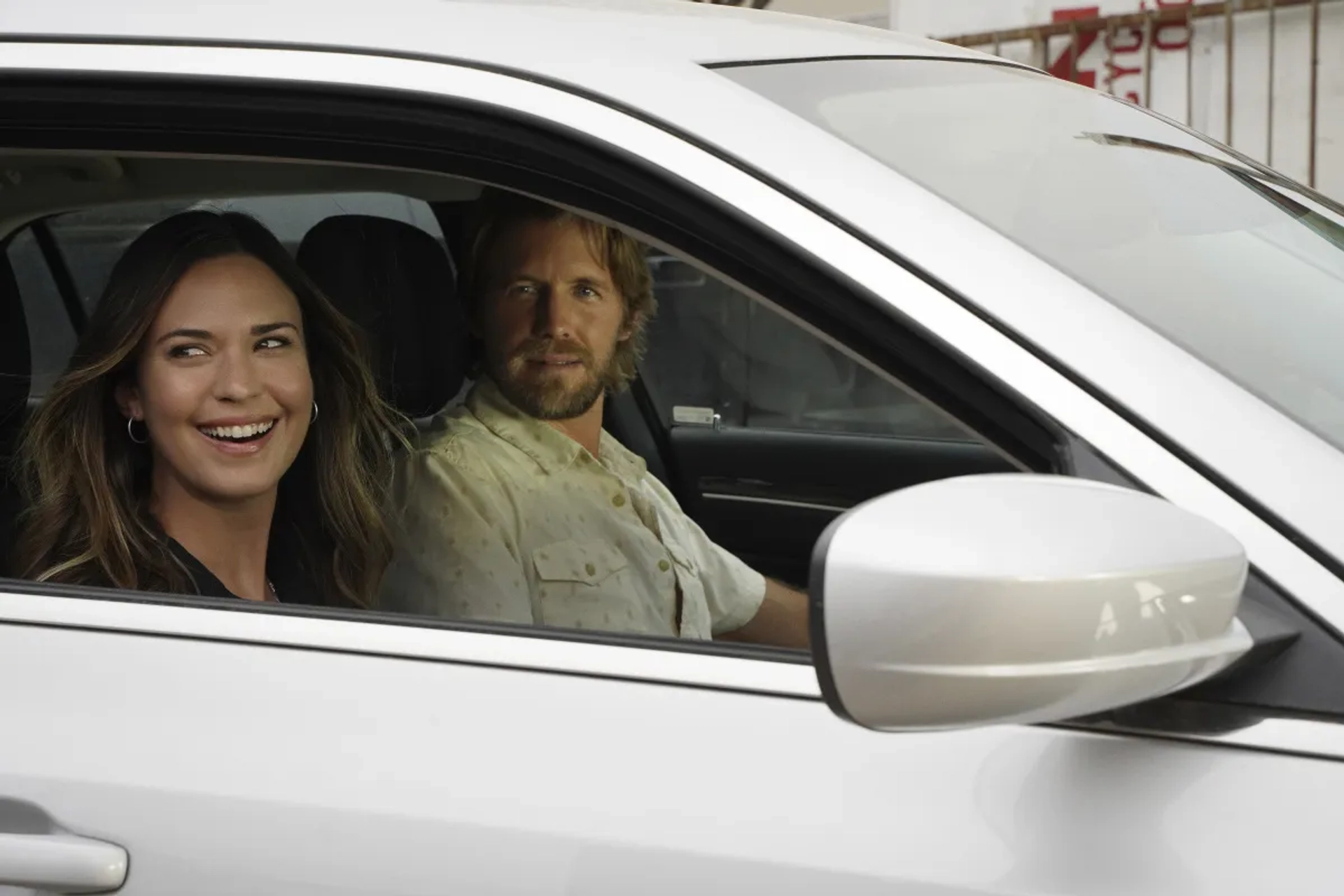 Odette Annable and Matt Barr in Walker (2021)