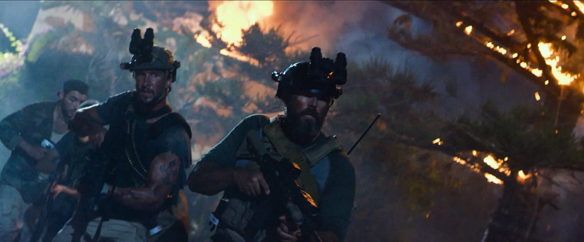 David Denman and Pablo Schreiber in 13 Hours (2016)