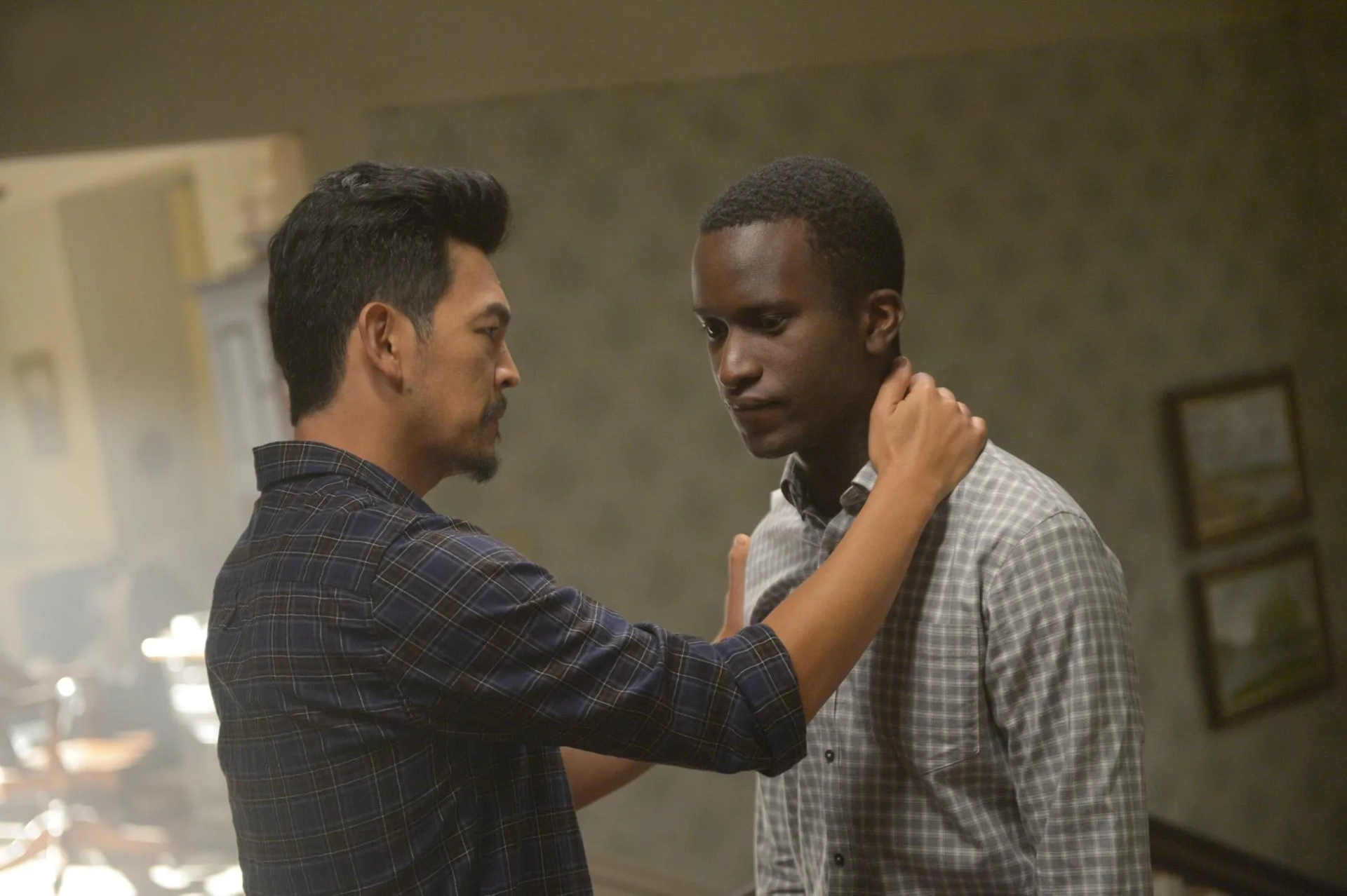 John Cho and Alex Barima in The Exorcist (2016)