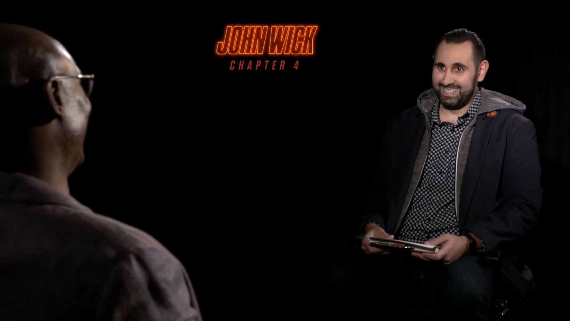 Lance Reddick and Sean Tajipour in John Wick: Chapter 4 (2023)