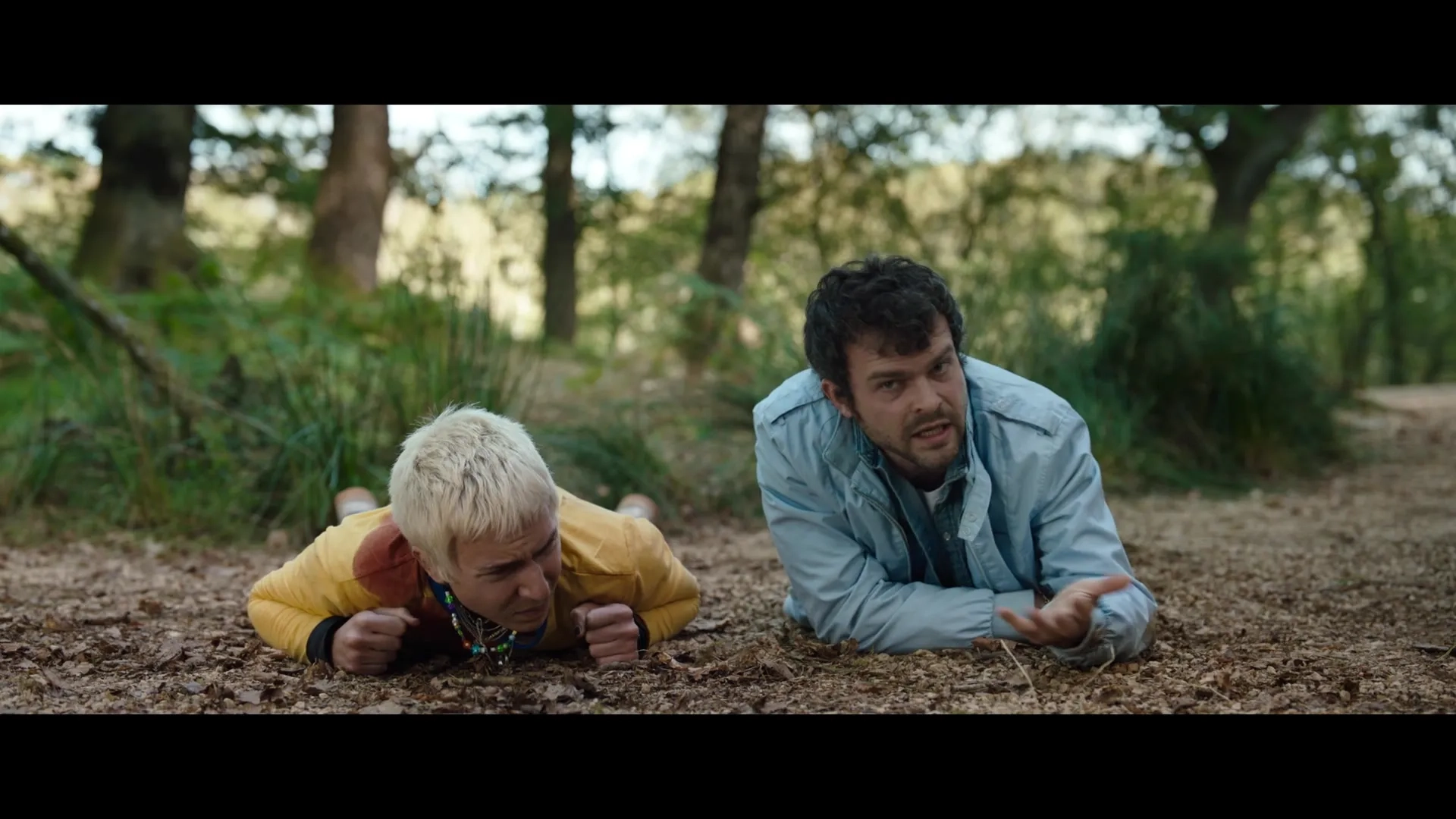 Alden Ehrenreich and Aaron Holliday in Cocaine Bear (2023)