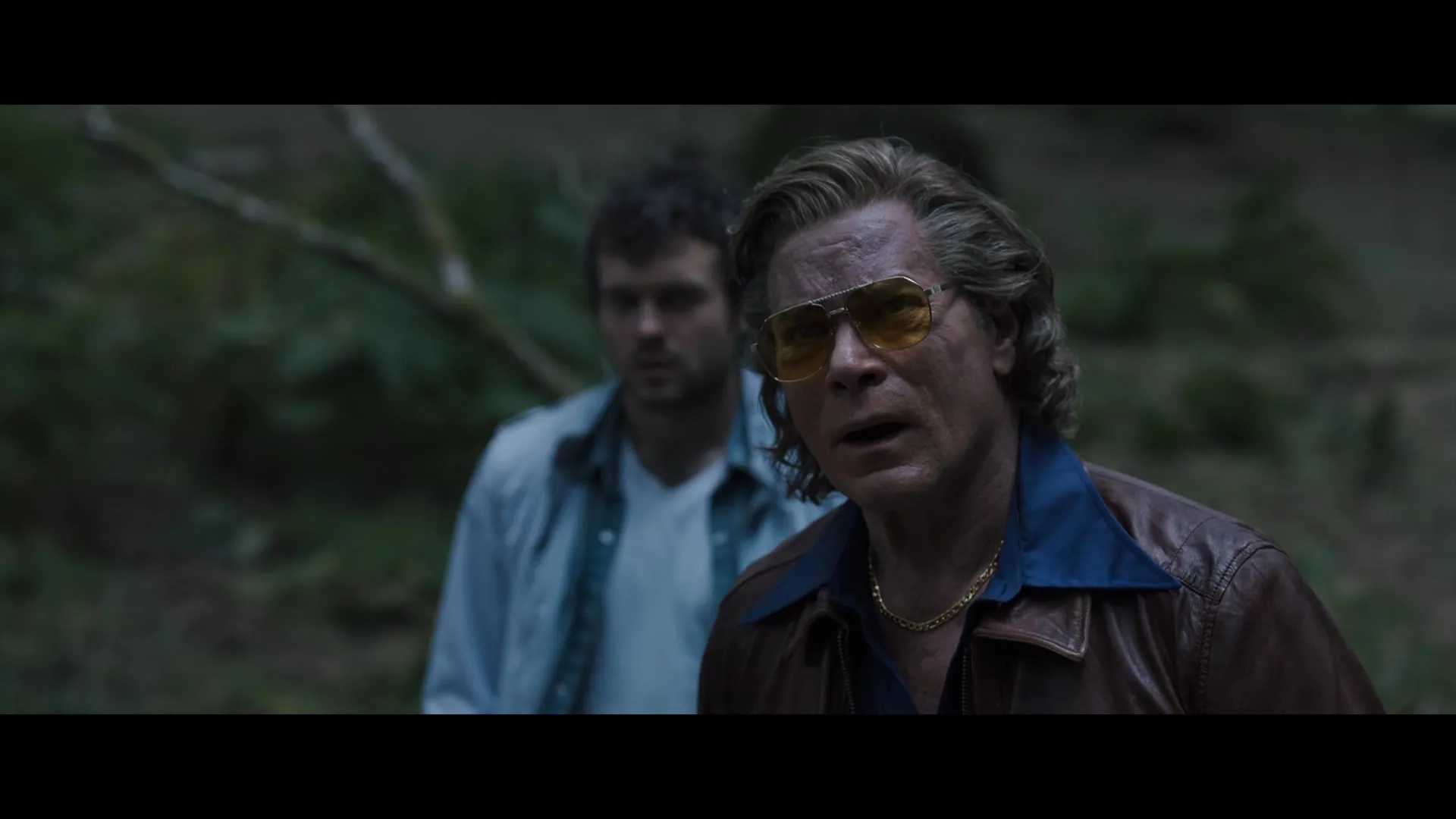 Ray Liotta and Alden Ehrenreich in Cocaine Bear (2023)