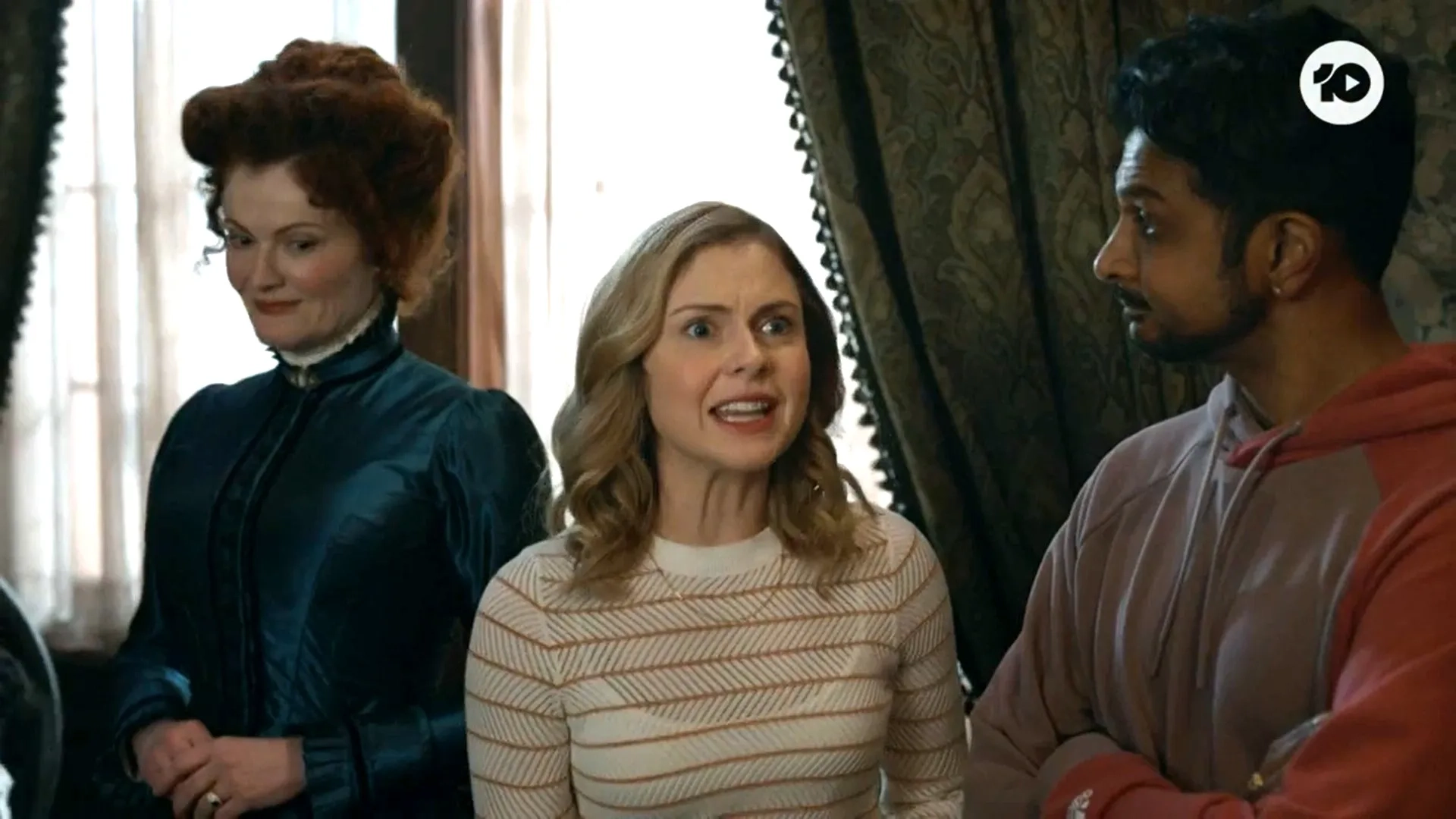 Rose McIver, Rebecca Wisocky, and Utkarsh Ambudkar in Ghosts (2021)