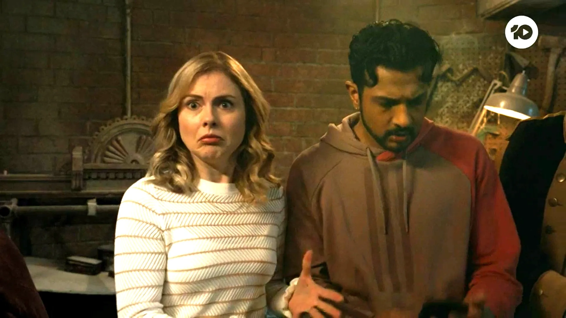 Rose McIver and Utkarsh Ambudkar in Ghosts (2021)