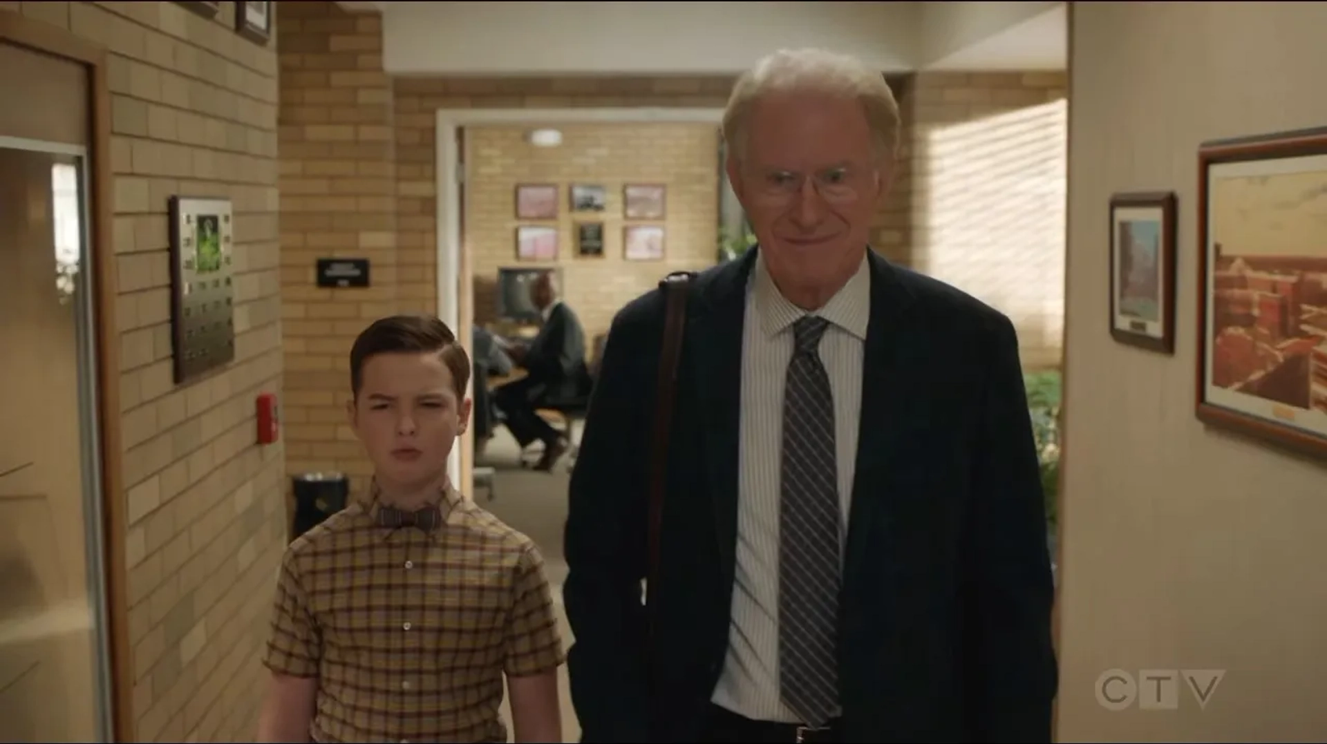 Ed Begley Jr. and Iain Armitage in Young Sheldon: The Grand Chancellor and a Den of Sin (2021)