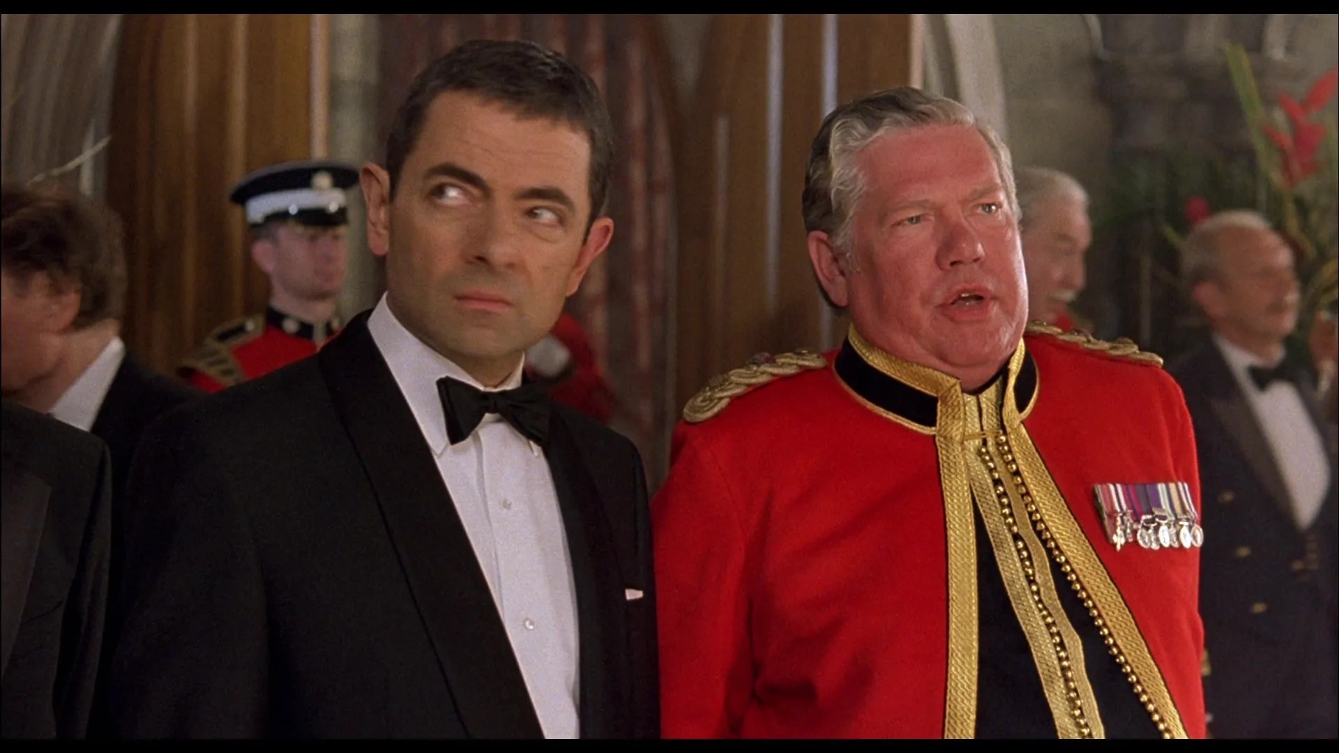 Rowan Atkinson and Rowland Davies in Johnny English (2003)