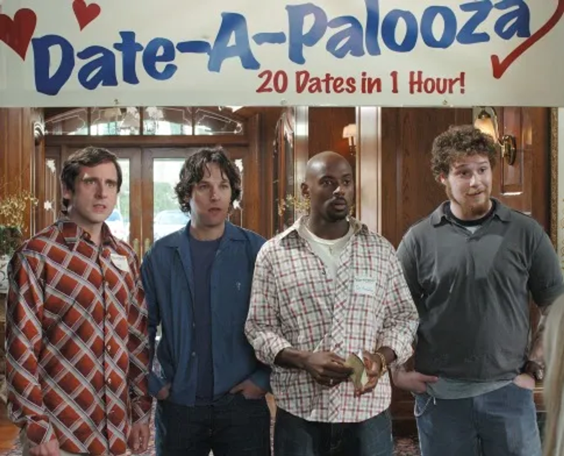 Steve Carell, Romany Malco, Seth Rogen, and Paul Rudd in The 40-Year-Old Virgin (2005)