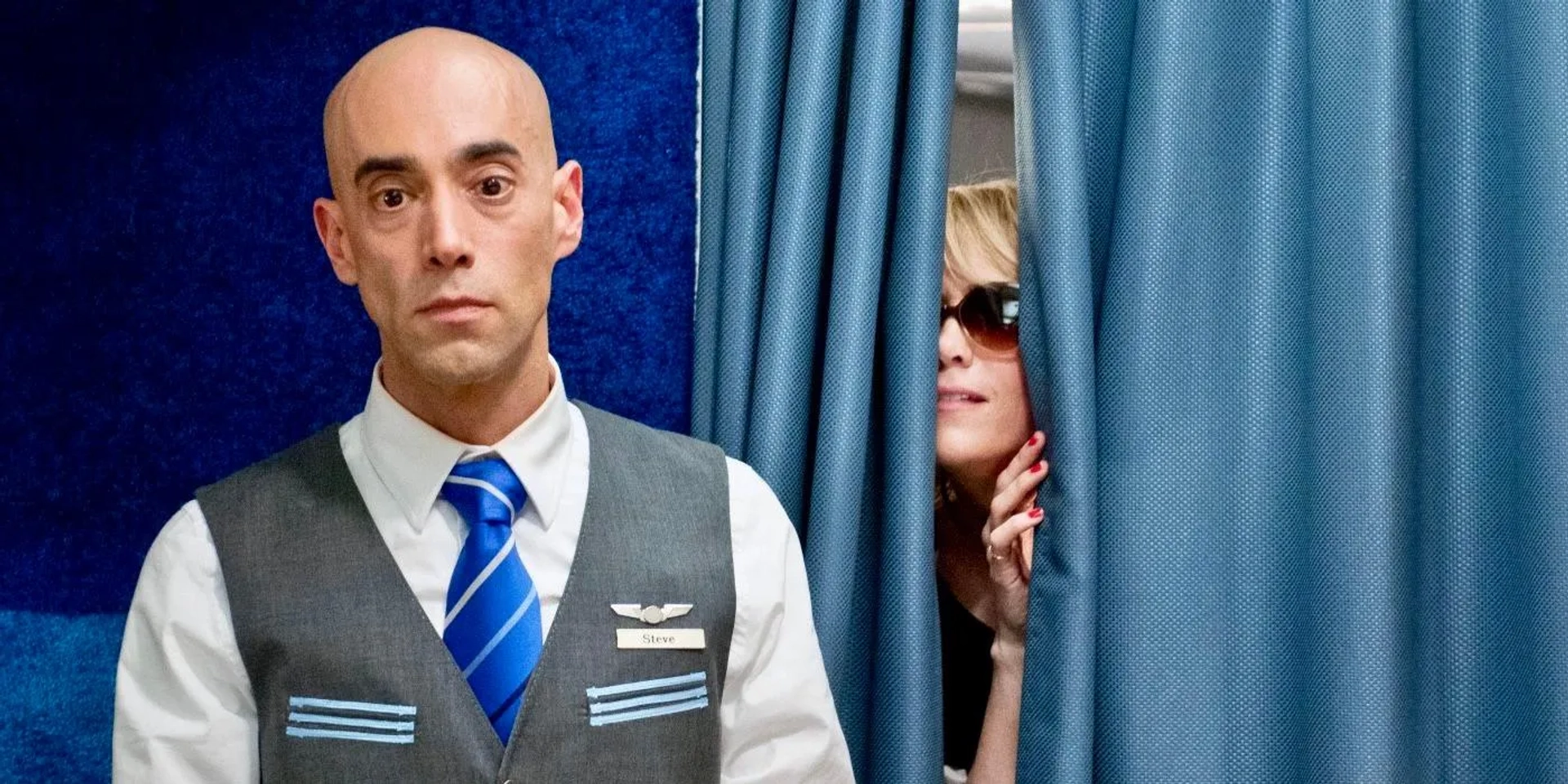 Mitch Silpa and Kristen Wiig in Bridesmaids (2011)