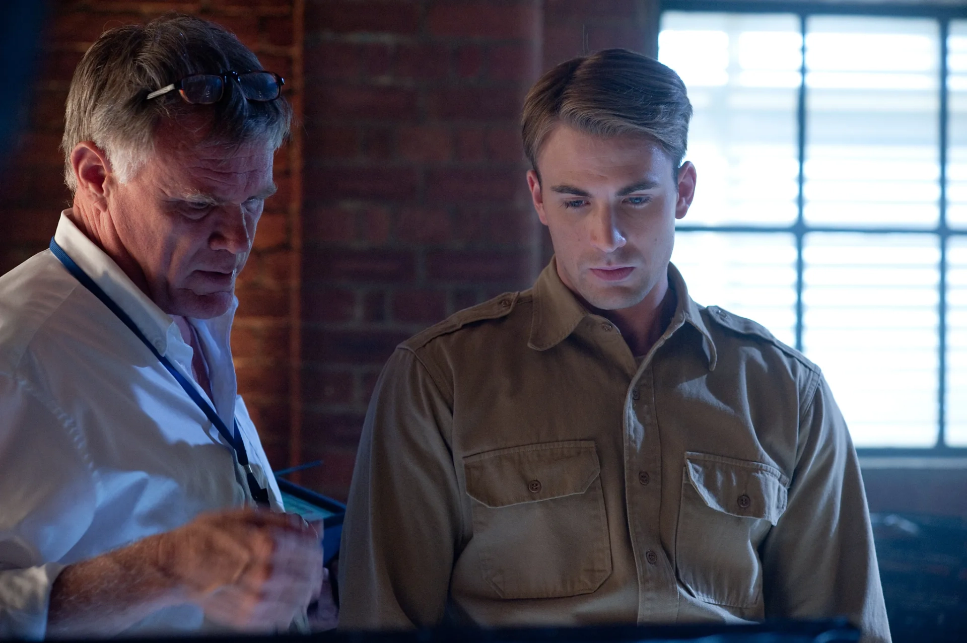 Joe Johnston and Chris Evans in Captain America: The First Avenger (2011)