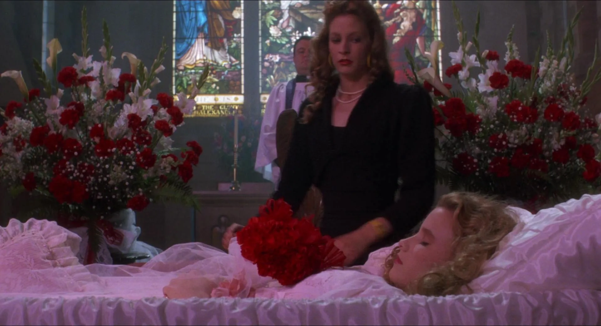 Lisanne Falk, Glenn Shadix, and Kim Walker in Heathers (1988)