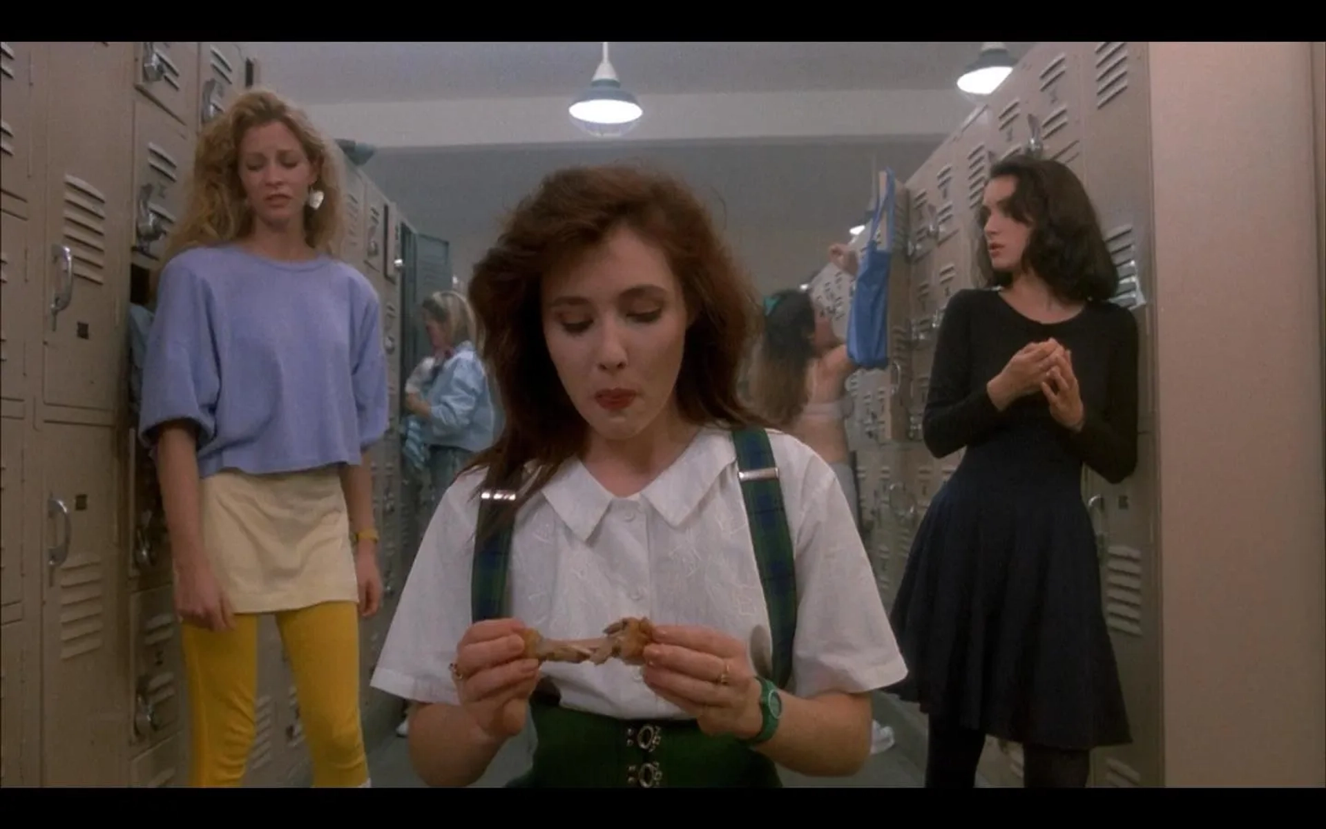 Winona Ryder, Shannen Doherty, and Lisanne Falk in Heathers (1988)