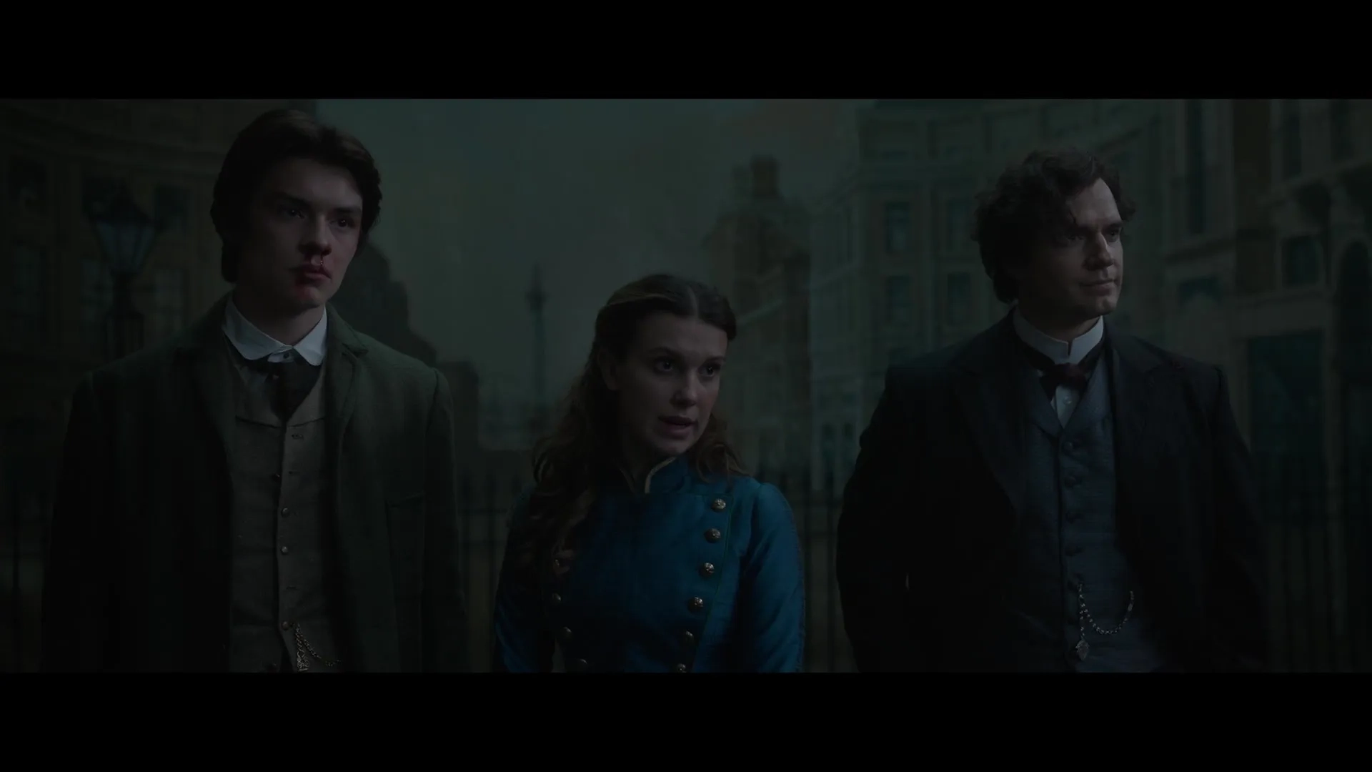 Henry Cavill, Millie Bobby Brown, and Louis Partridge in Enola Holmes 2 (2022)