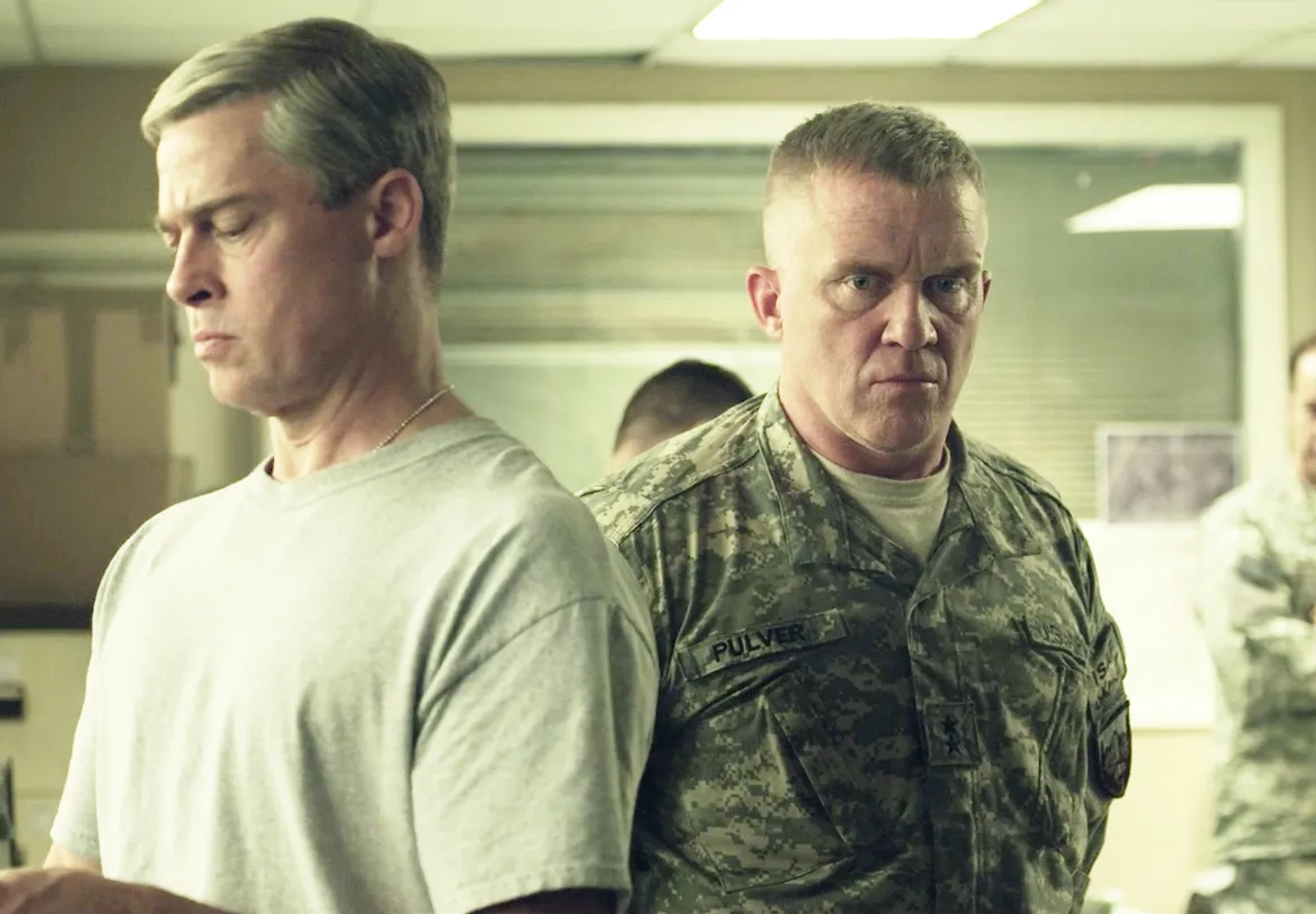 Brad Pitt and Anthony Michael Hall in War Machine (2017)