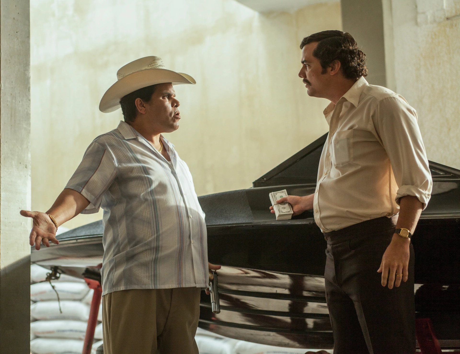 Luis Guzmán and Wagner Moura in Narcos (2015)