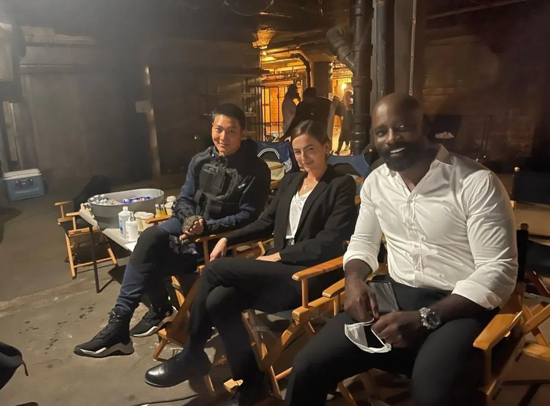 Camilla Belle, Mike Colter, and Joo Won in Carter (2022)