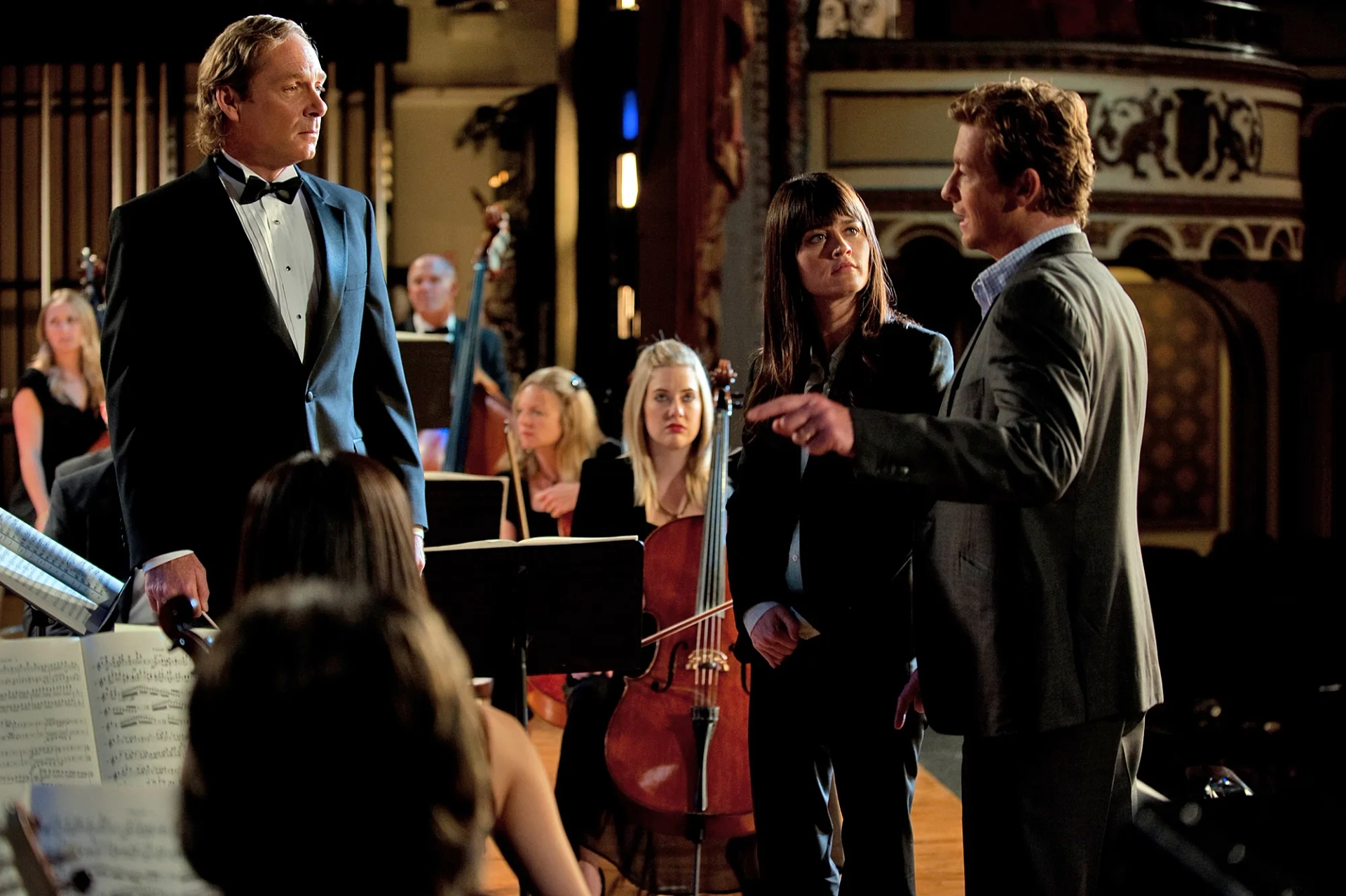 Robin Tunney, Simon Baker, and John Hans Tester in The Mentalist (2008)