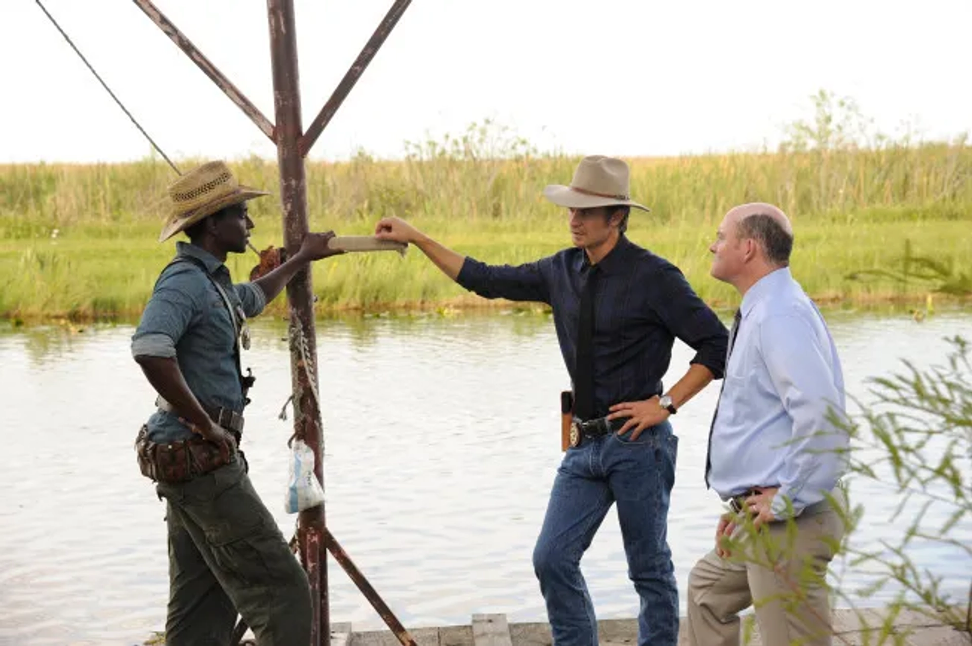 David Koechner, Timothy Olyphant, and Edi Gathegi in Justified (2010)