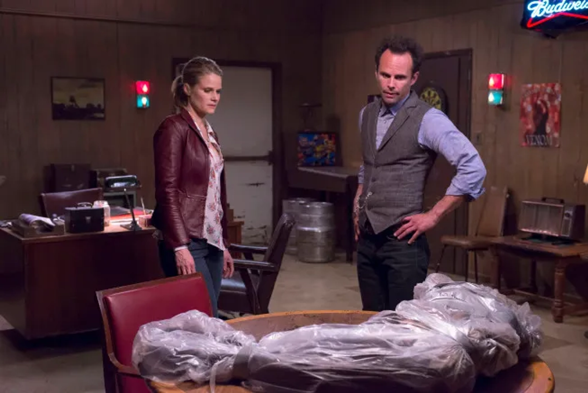 Joelle Carter and Walton Goggins in Justified (2010)