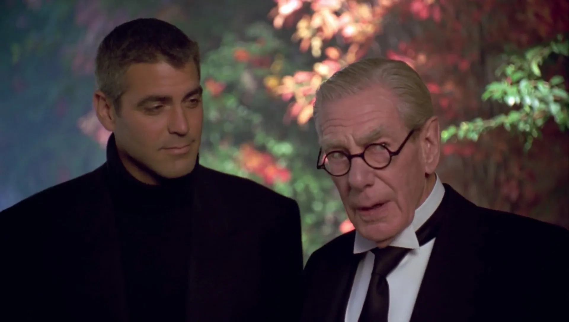 George Clooney and Michael Gough in Batman & Robin (1997)