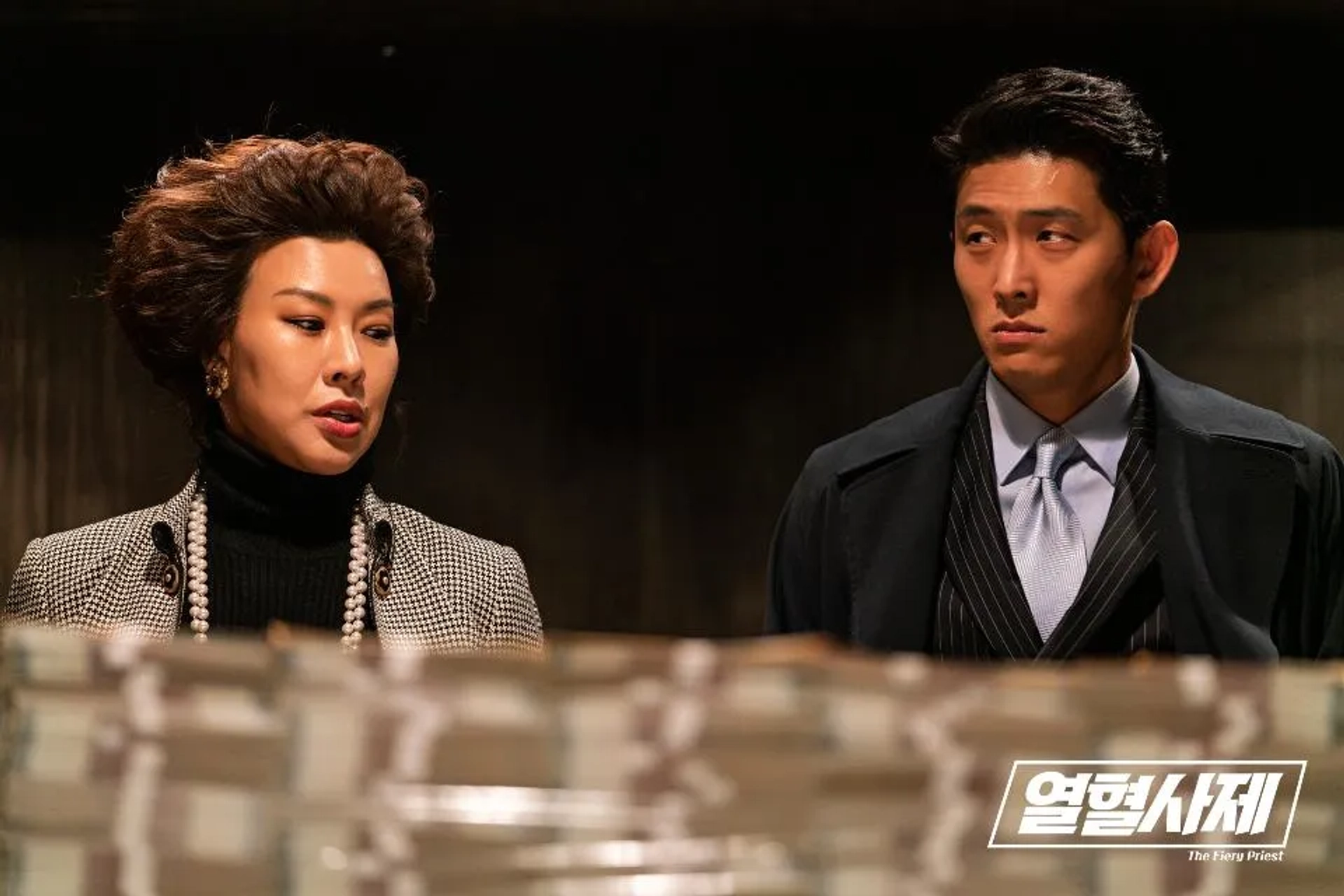 Jung Young-joo and Joon Go in The Fiery Priest: Let Me Teach You a Lesson (2019)