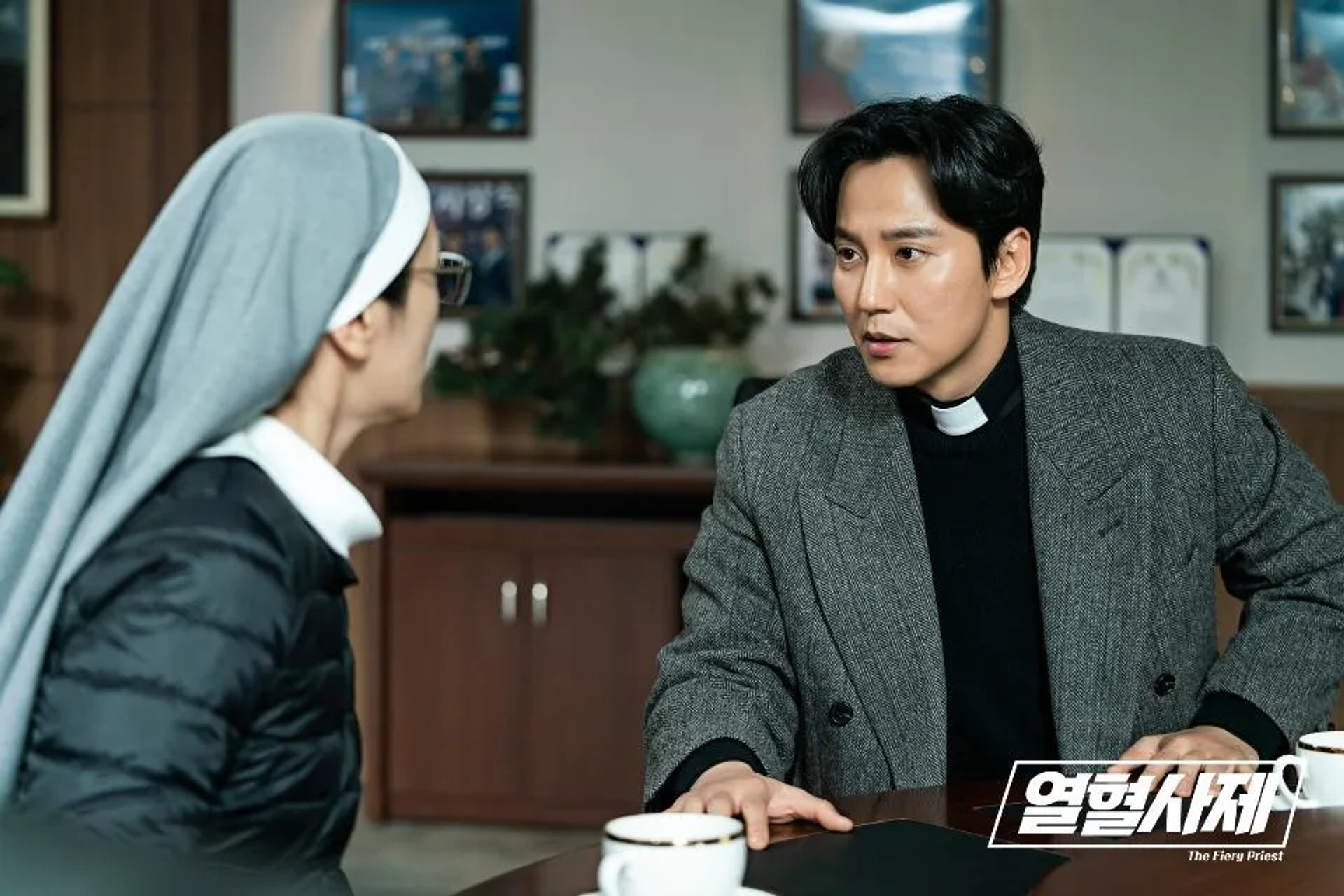 Kim Nam-gil and Baek Ji-won in The Fiery Priest: Hae Il And Seung Ah Find The Witnesses (2019)